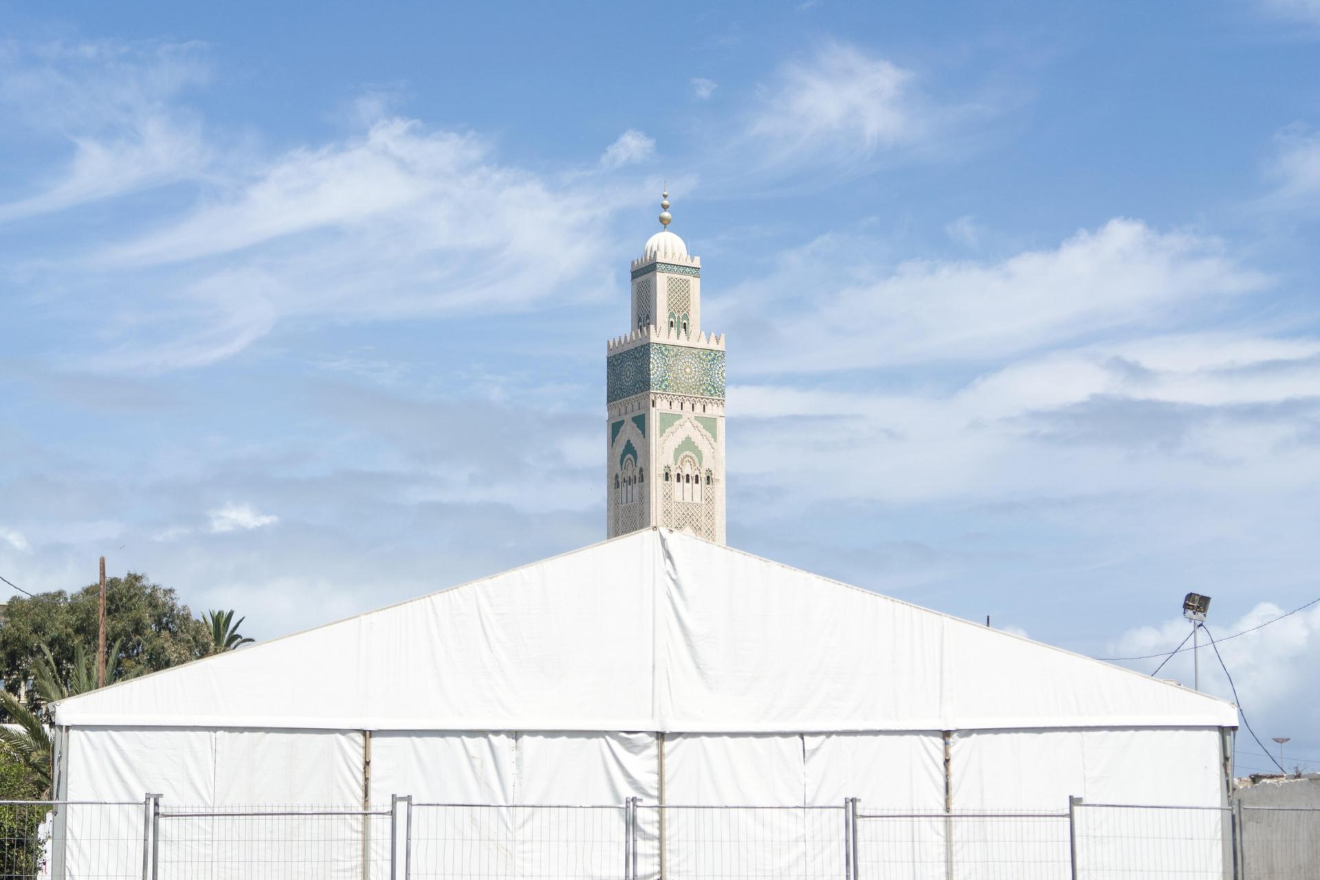 Authorities erected this tent for homeless people needing services during the lockdown. Behind it rises the minaret of the Hassan II mosque, which is now closed. Usually, Hassan II, Africa’s biggest mosque, gets as many as 200,000 worshipers nightly durin