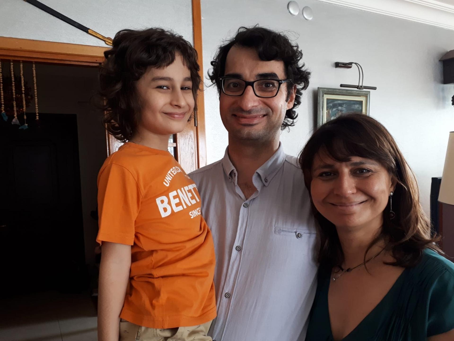 Özge Terkoğlu and her husband, Barış Terkoğlu, are pictured with their young son.