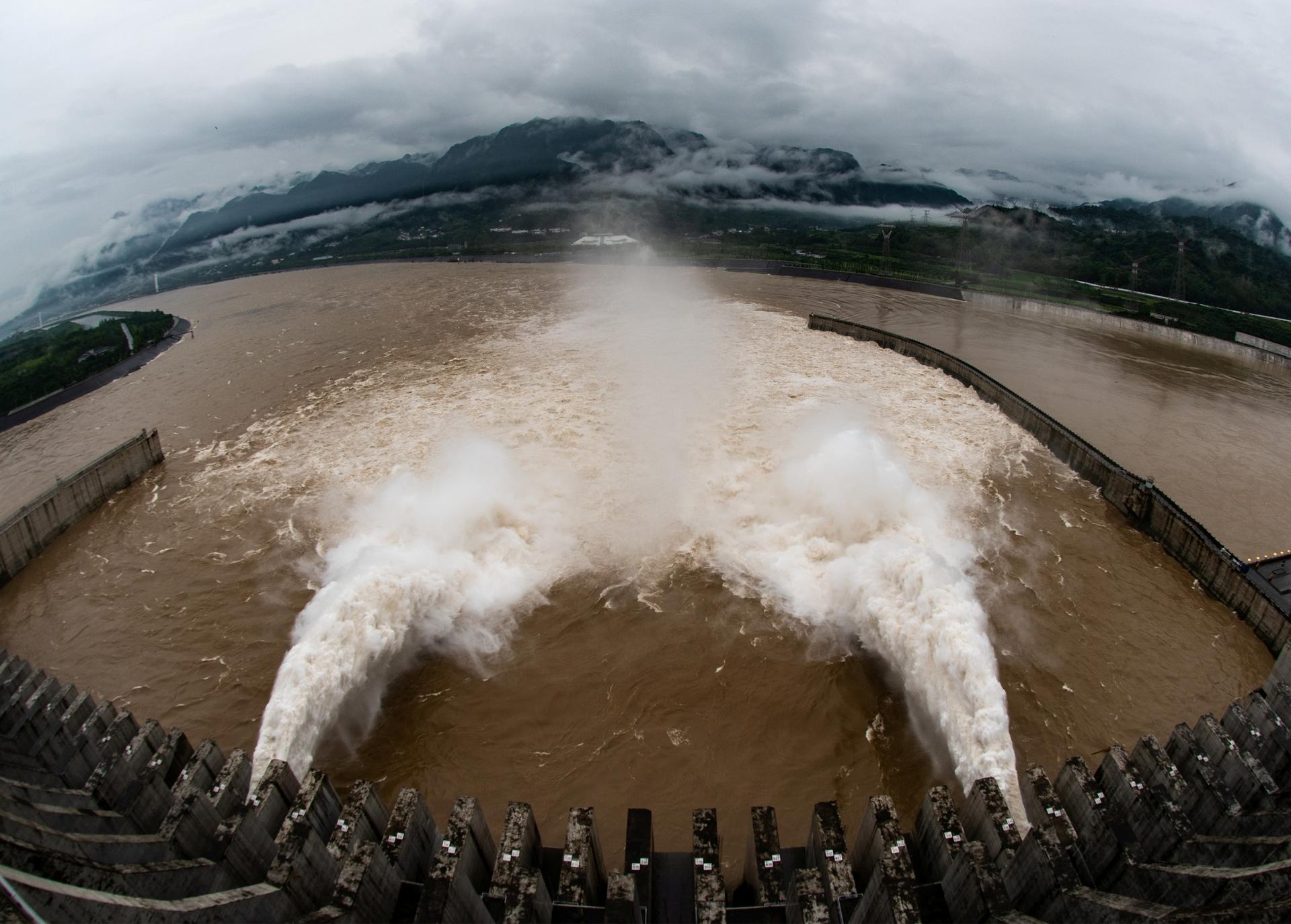 A gush of water discharges to lower water levels from the Three Gorges Dam