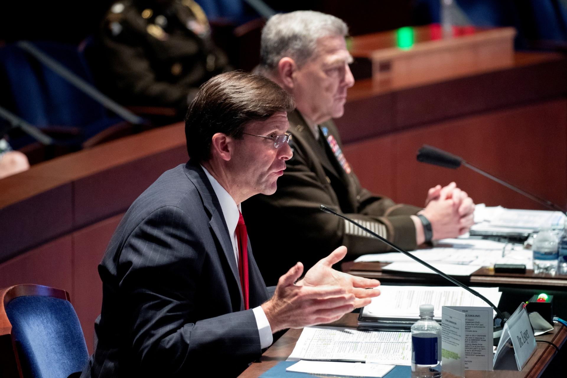 Pentagon officials speak at a hearing