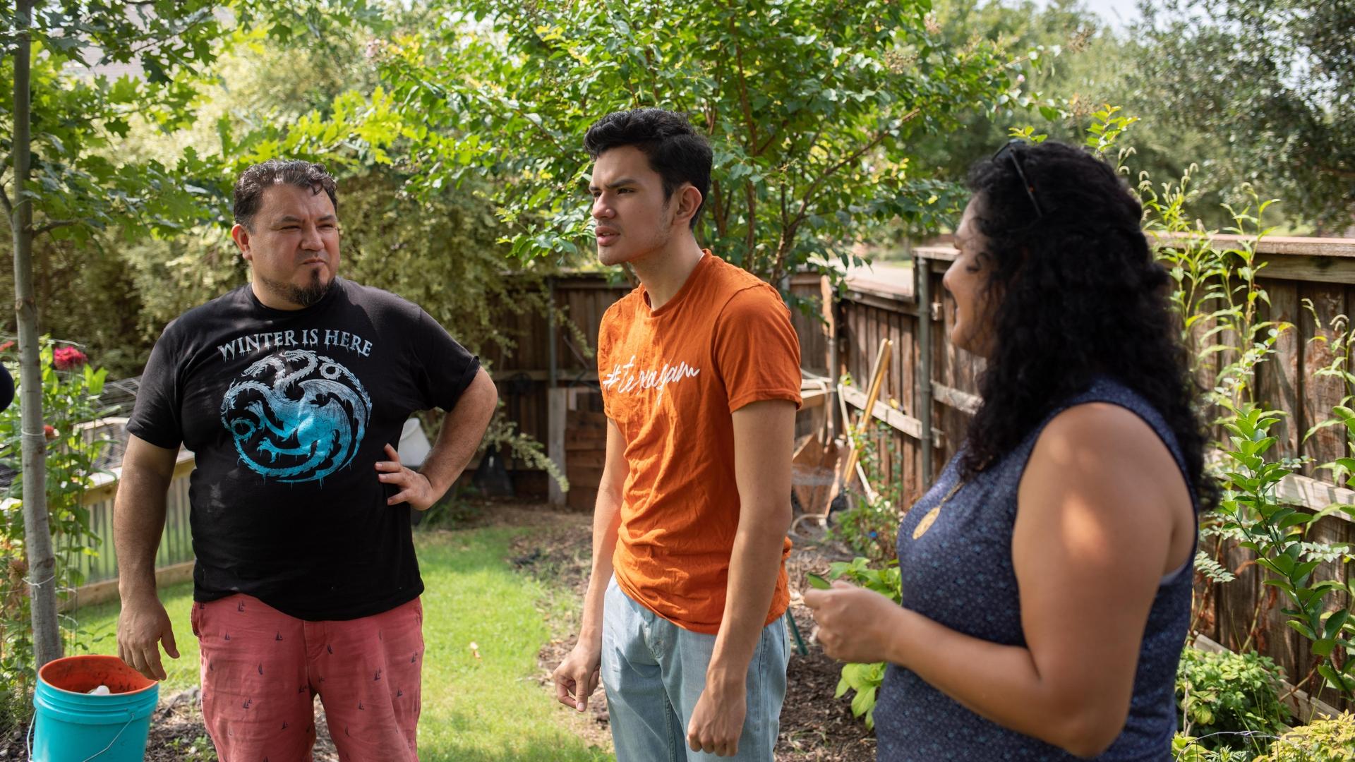 Izcan Ordaz, center, has been spending more time with his parents Simon Ordaz, left, and Xochitl Ortiz during the pandemic.
