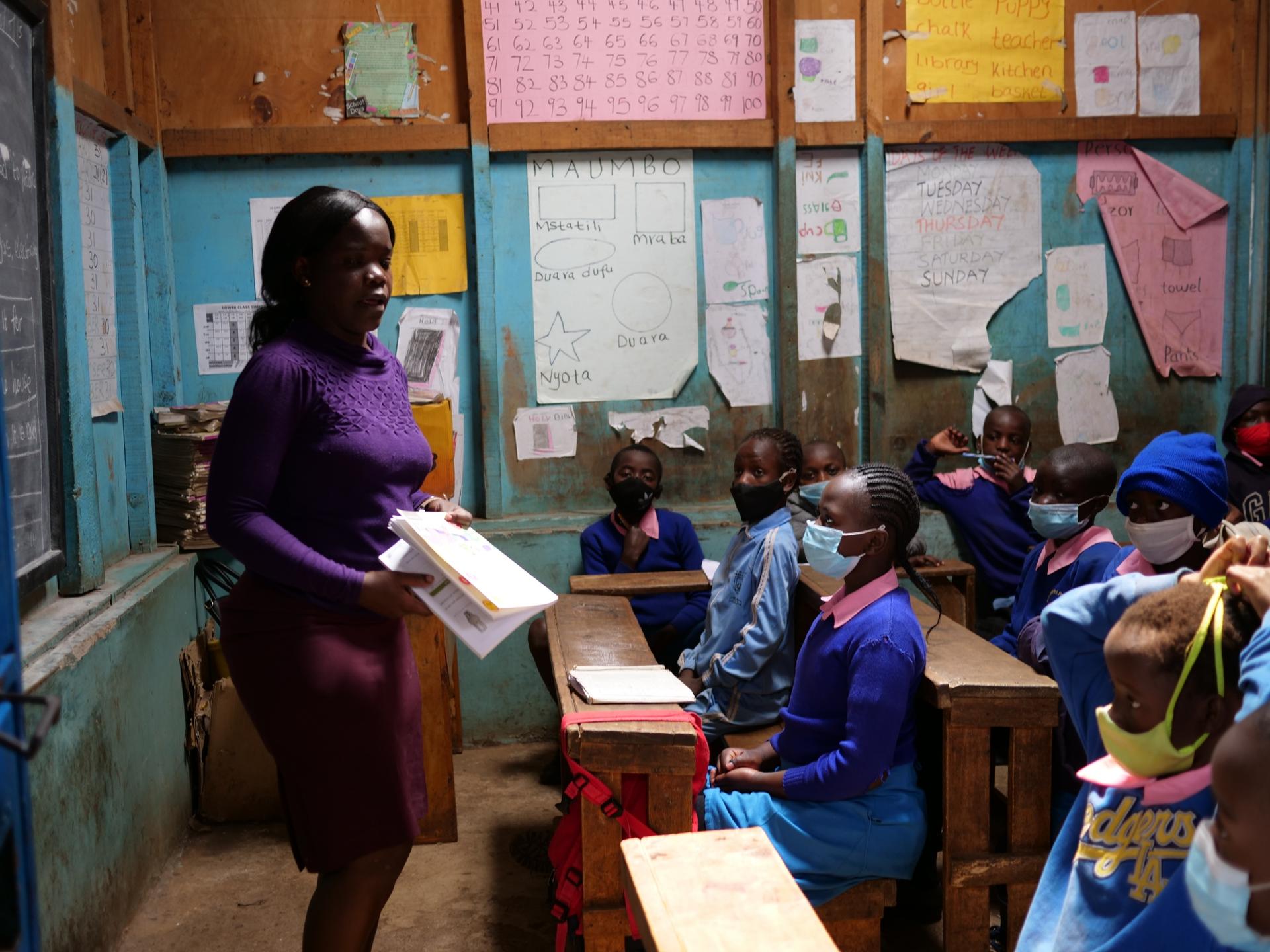 Primary school teacher Judith Odero teaches science to a grade four class at the Global One School in Nairobi, Kenya.