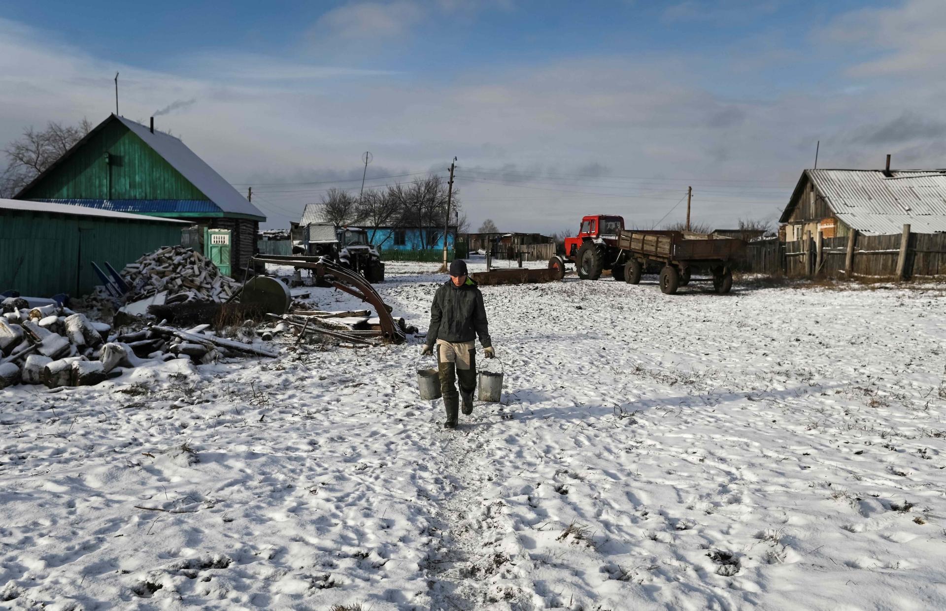 Student Alexei Dudoladov, 21, also works on his family’s farm.