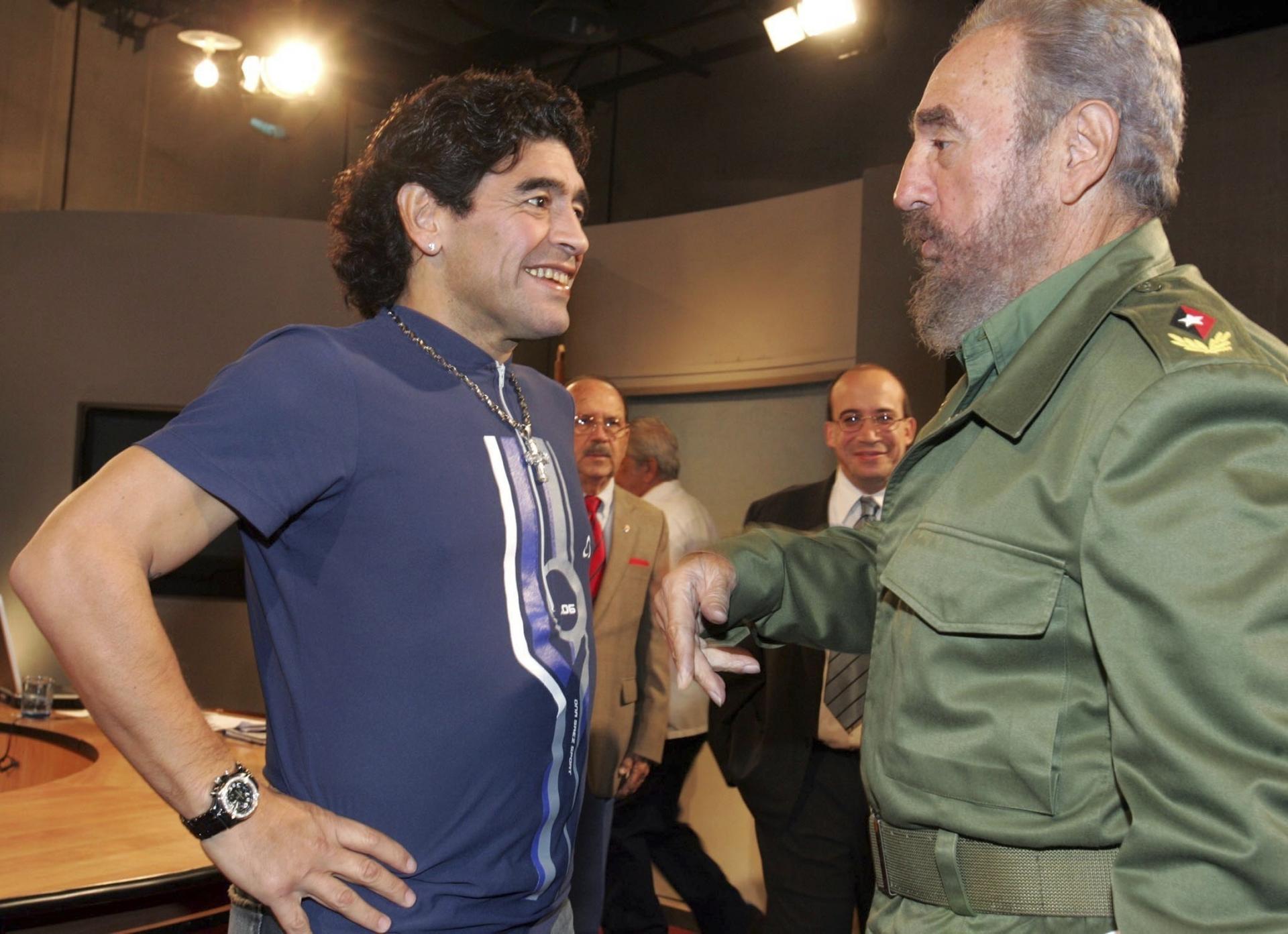 In this Oct. 27, 2005 file photo released by the Cuban government's National Information Agency (AIN), Cuban President Fidel Castro, right, meets Argentina's former soccer star Diego Maradona on the program "Mesa Redonda" in Havana, Cuba.