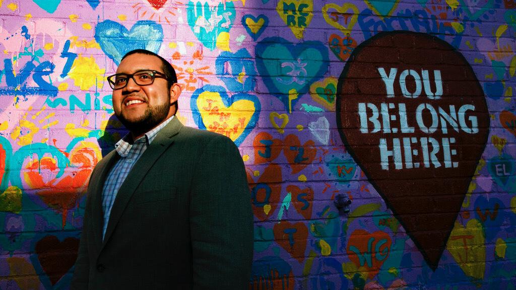 Ricky Hurtado, the first Latino candidate to run for North Carolina's House of Representatives, poses for a portrait by a mural in Graham on March 10, 2020. It's been a tumultuous few months for Hurtado. In November, the 32-year-old son of a Salvadoran im