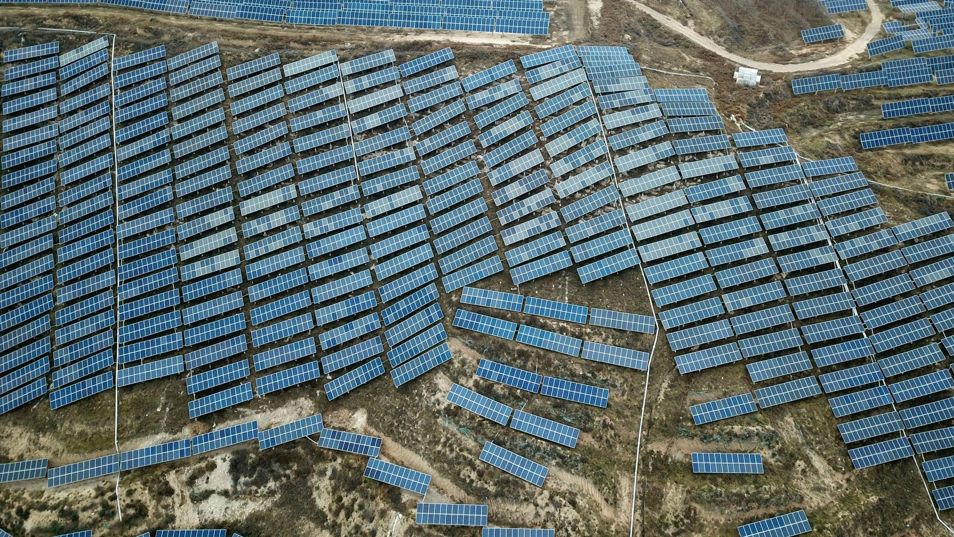 A solar panel installation is seen in Ruicheng County in central China's Shanxi Province, Nov. 27, 2019. China's Premier Li Keqiang announced that the country would target a reduction of 18% in carbon intensity over the course of the next five years as pa