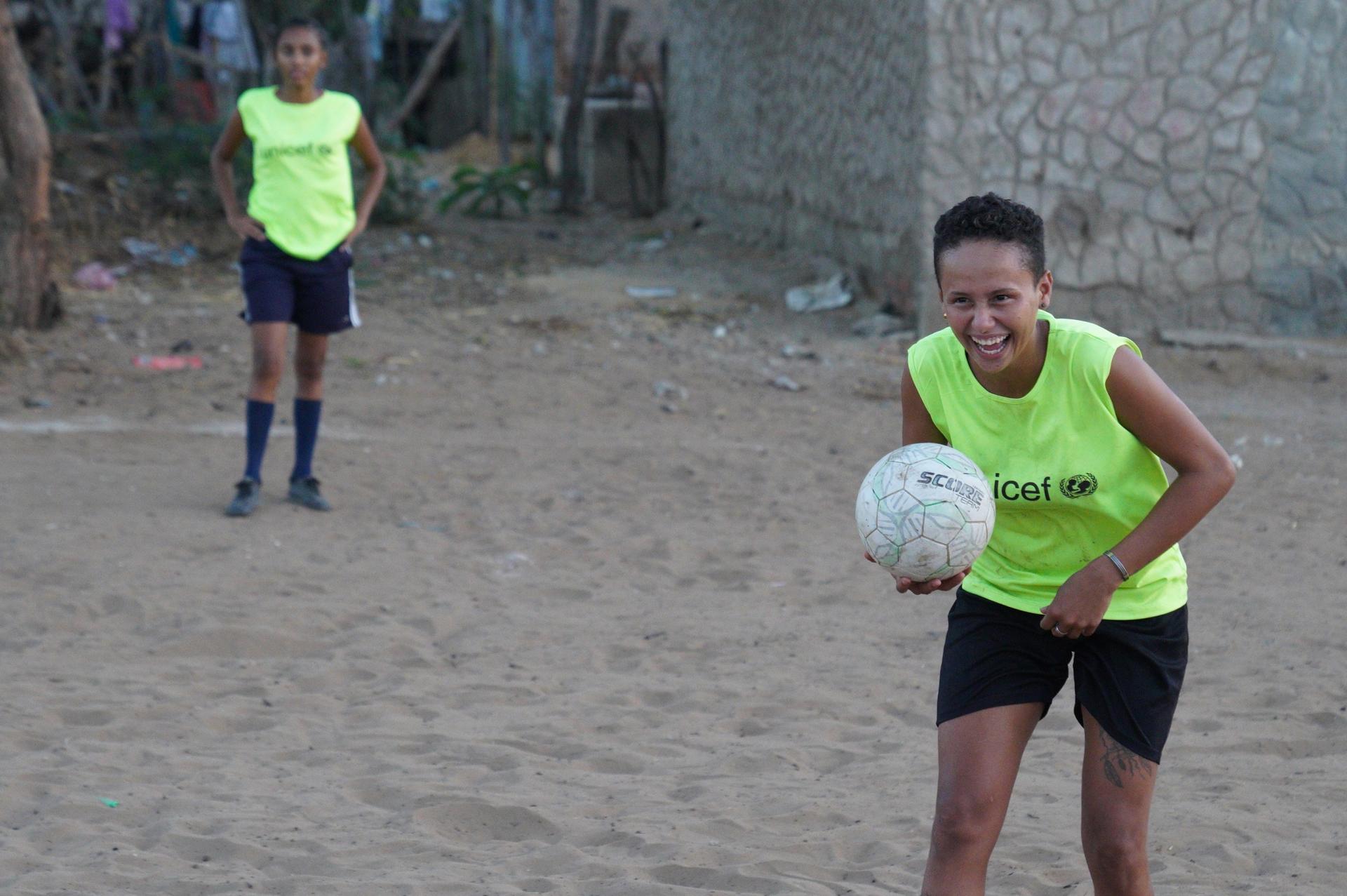 Maria Isabel Parra, 21, says that playing kick ball helps her to meet new people and deal with some of the stress that comes with being an unemployed migrant.