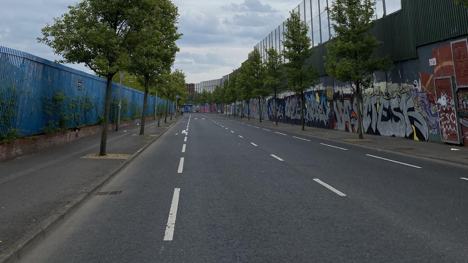 One of the so-called "peace walls" that divide Protestant and Catholic areas of west Belfast. 