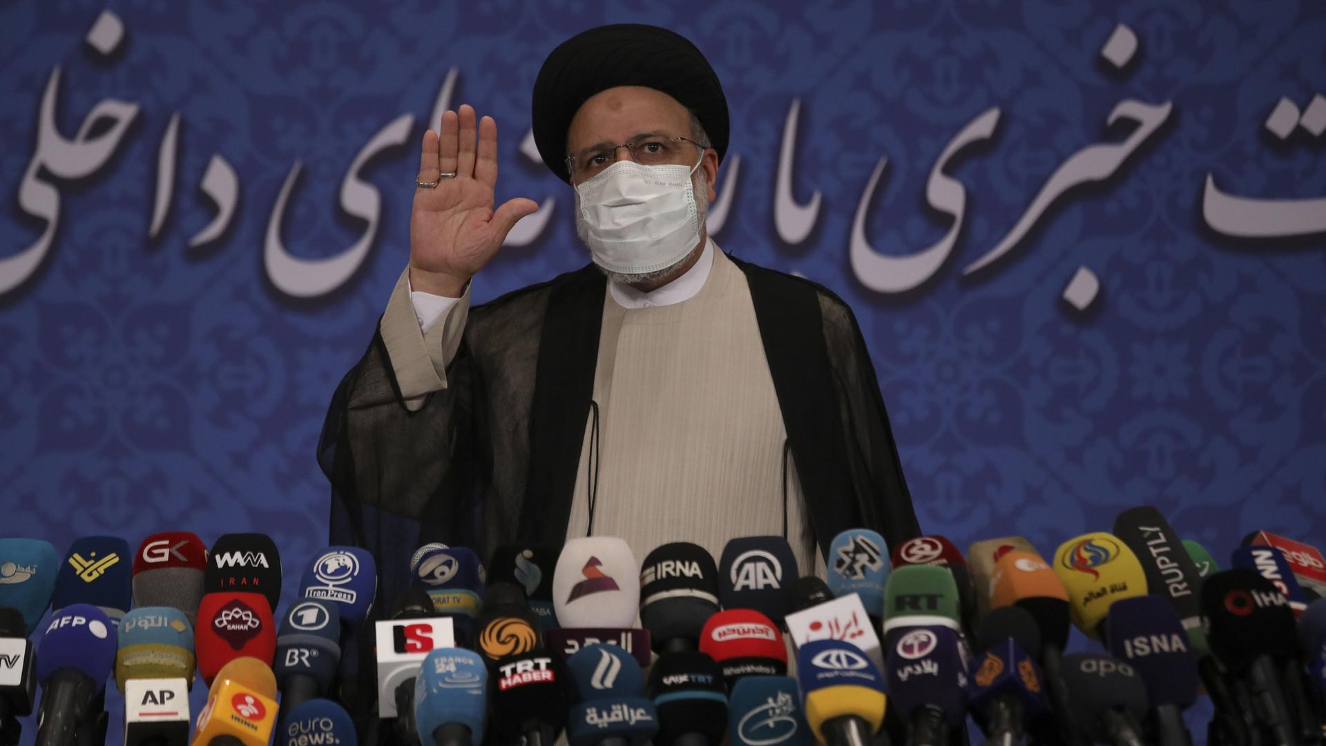 Iran's new President-elect Ebrahim Raisi speaks during a press conference
