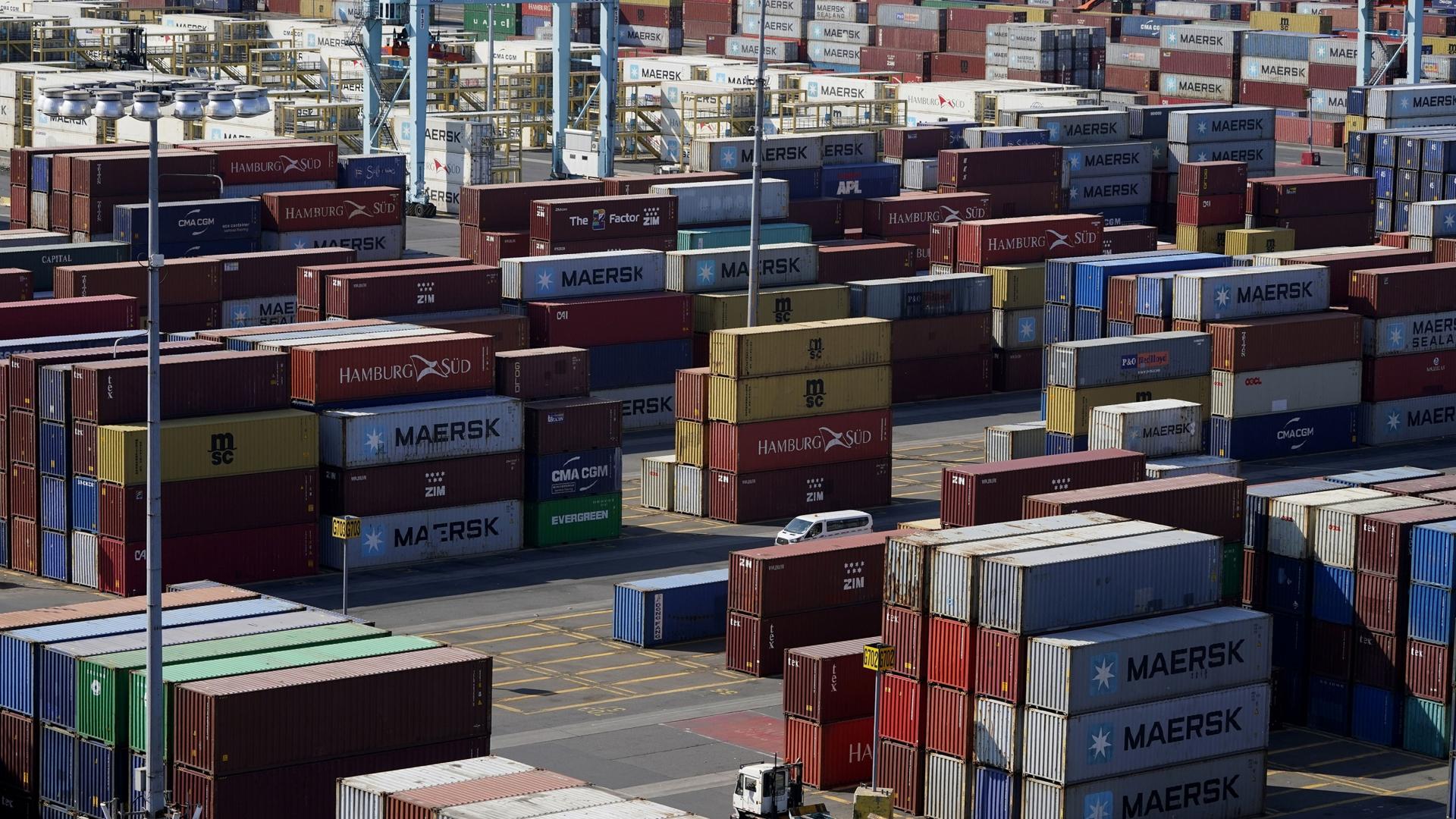 Shipping containers are stacked in the Port of New York and New Jersey in Elizabeth, New Jersey, May 20, 2021.