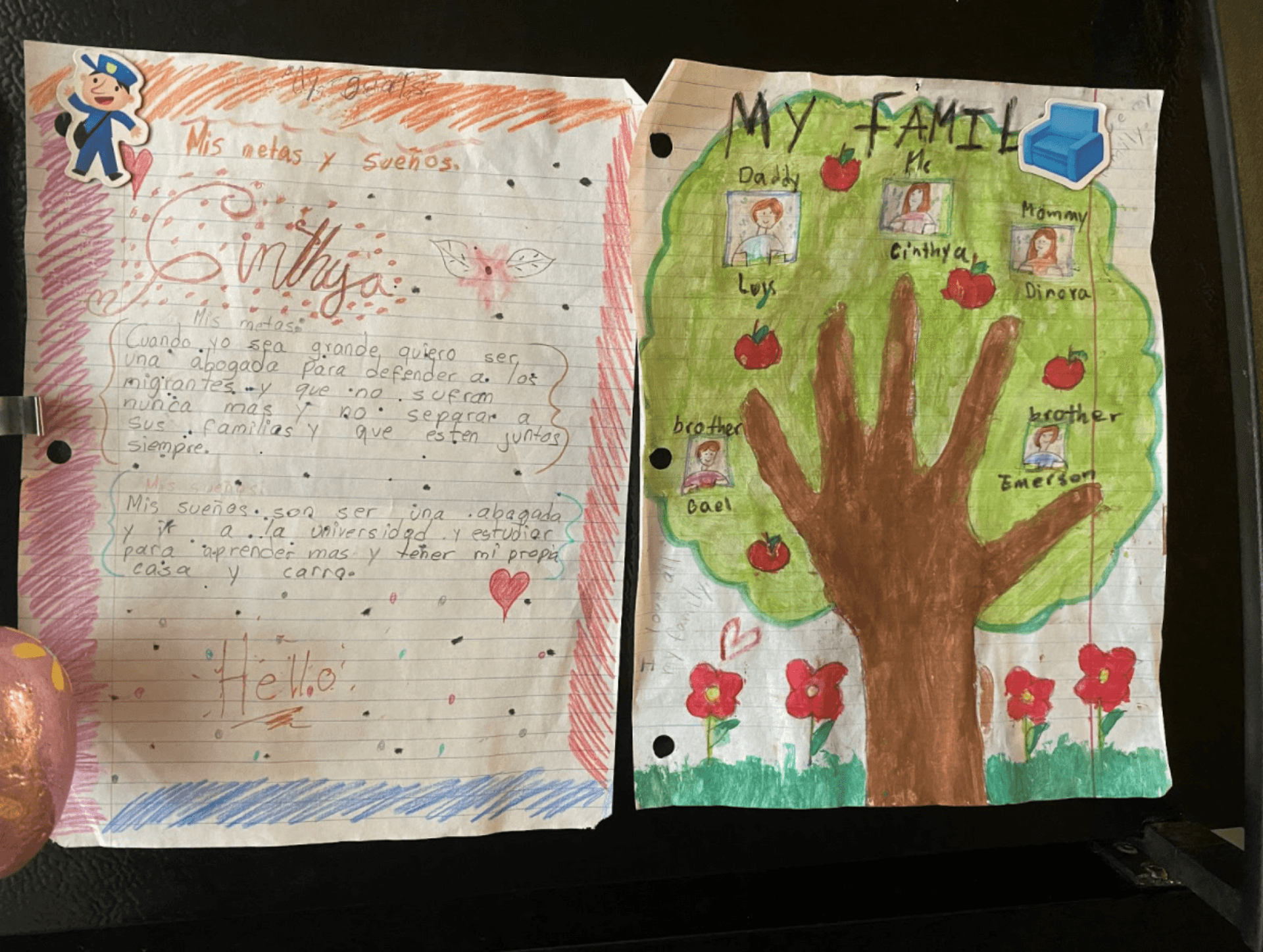Drawings and writing by Cinthya Hernandez, 11, are posted on her family’s refrigerator.
