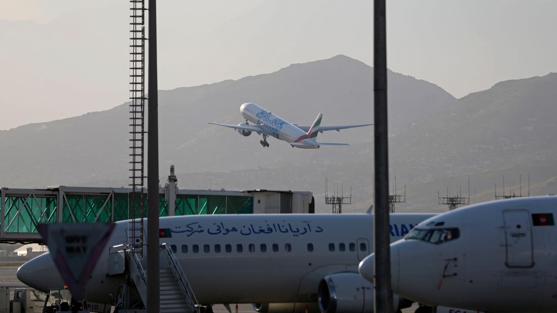 A plane takes off from Hamid Karzai International Airport in Kabul, Afghanistan, Sunday, July 4, 2021.