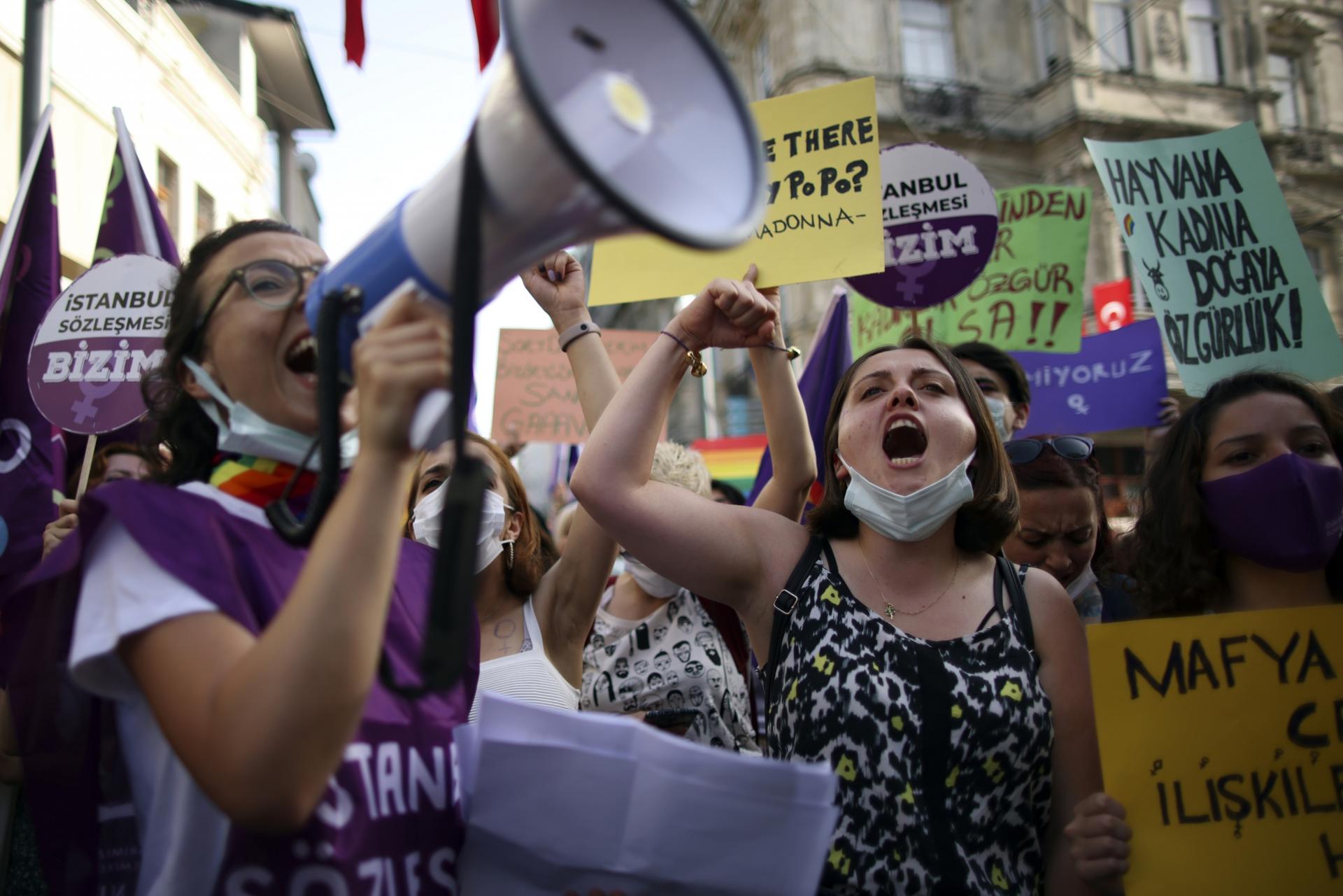 People chant slogans during a protest against the government's decision to withdraw from Istanbul Convention, in Istanbul, Thursday, July 1, 2021. 