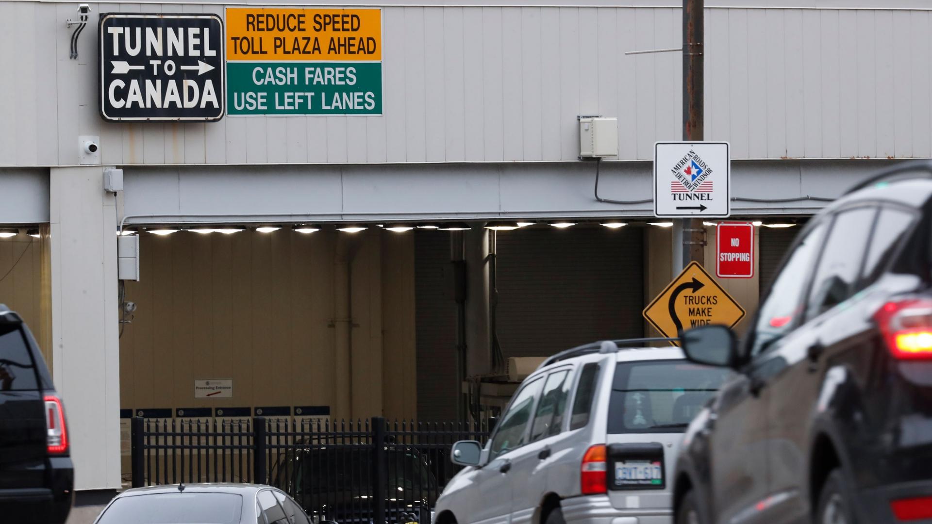 In this March 16, 2020, file photo, vehicles enter the Detroit-Windsor Tunnel in Detroit to travel to Canada. 