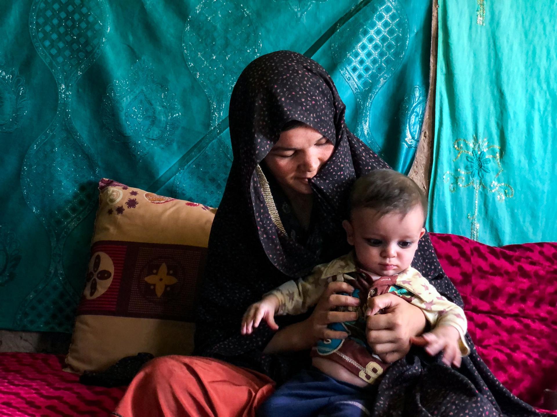 Negineh and her 7-month-old son Ibrahim fled their home in Badghis in northwestern Afghanistan. Her husband works in Iran and hasn't seen their son since he was born. Now, Negineh and Ibrahim are in Herat, in relative safety but they both face hunger.