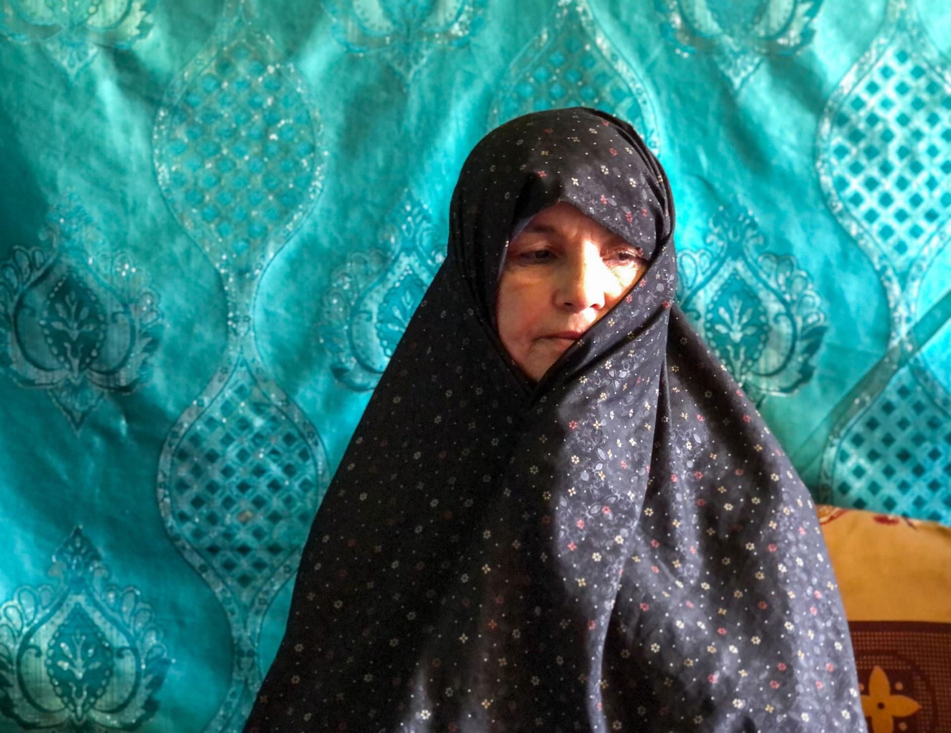 Fatimeh, 45, had to flee her home in Ghaleh-Now in western Afghanistan because the Taliban entered her city. Her home ended up being on the front lines, she said, and she had to leave with only the clothes on her back.