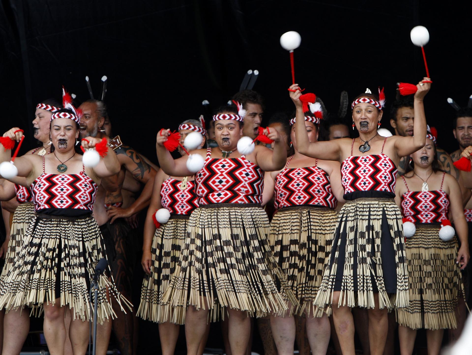 In this Feb. 6, 2015 photo, dancers twirl white "poi" balls as part of an indigenous Maori performance, in Waitangi, New Zealand, to mark the 175th anniversary of the signing of the country's founding document, the Treaty of Waitangi.