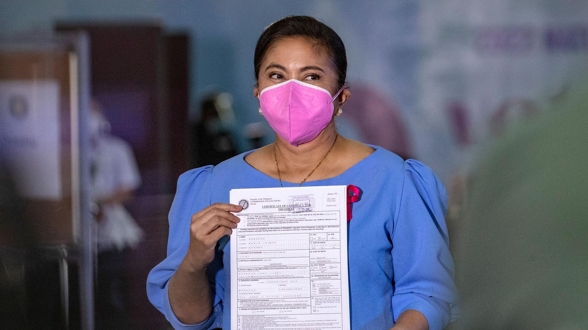 Philippine Vice President Leni Robredo poses after filing her certificate of candidacy for next year's presidential elections before the Commission on Elections at the Sofitel Harbor Garden Tent in Metropolitan Manila on Thursday, Oct. 7, 2021. 