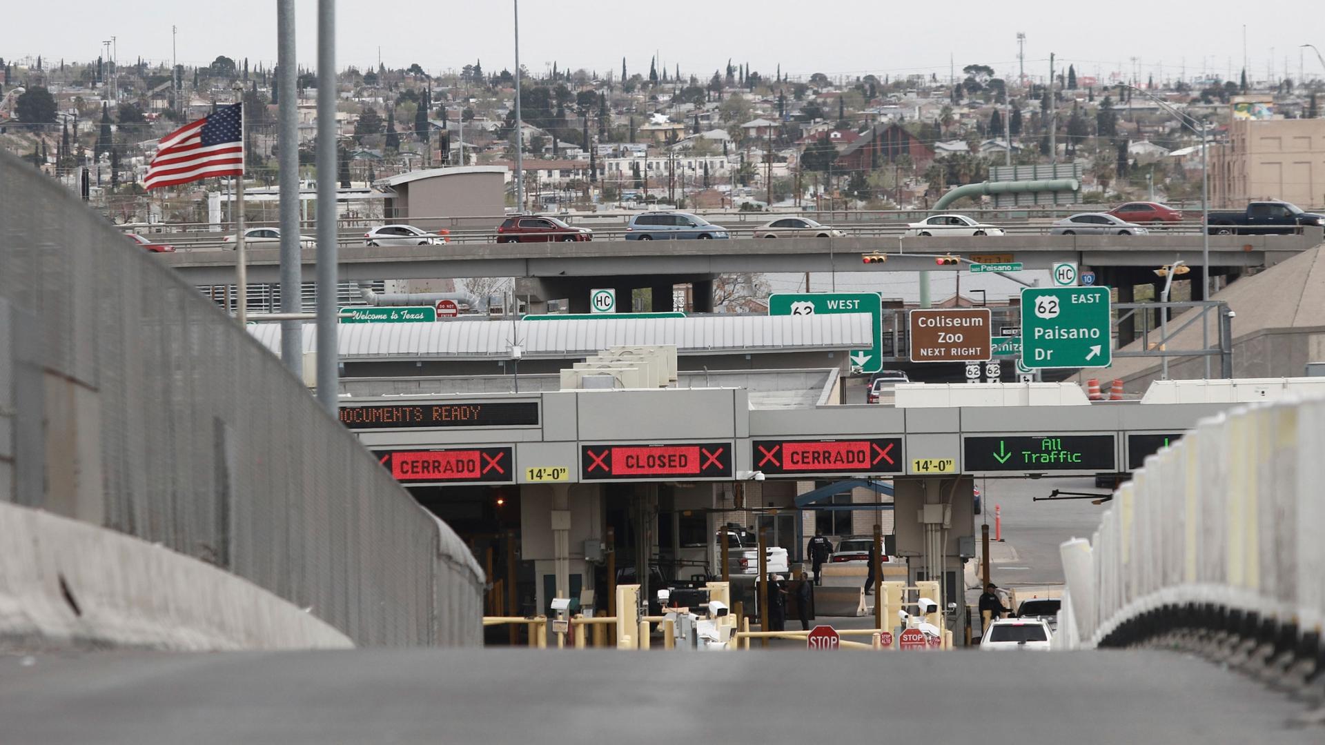 Digital signs signal closed at an international bridge checkpoint at the US-Mexico border that joins Ciudad Juarez and El Paso, Saturday, March 21, 2020.