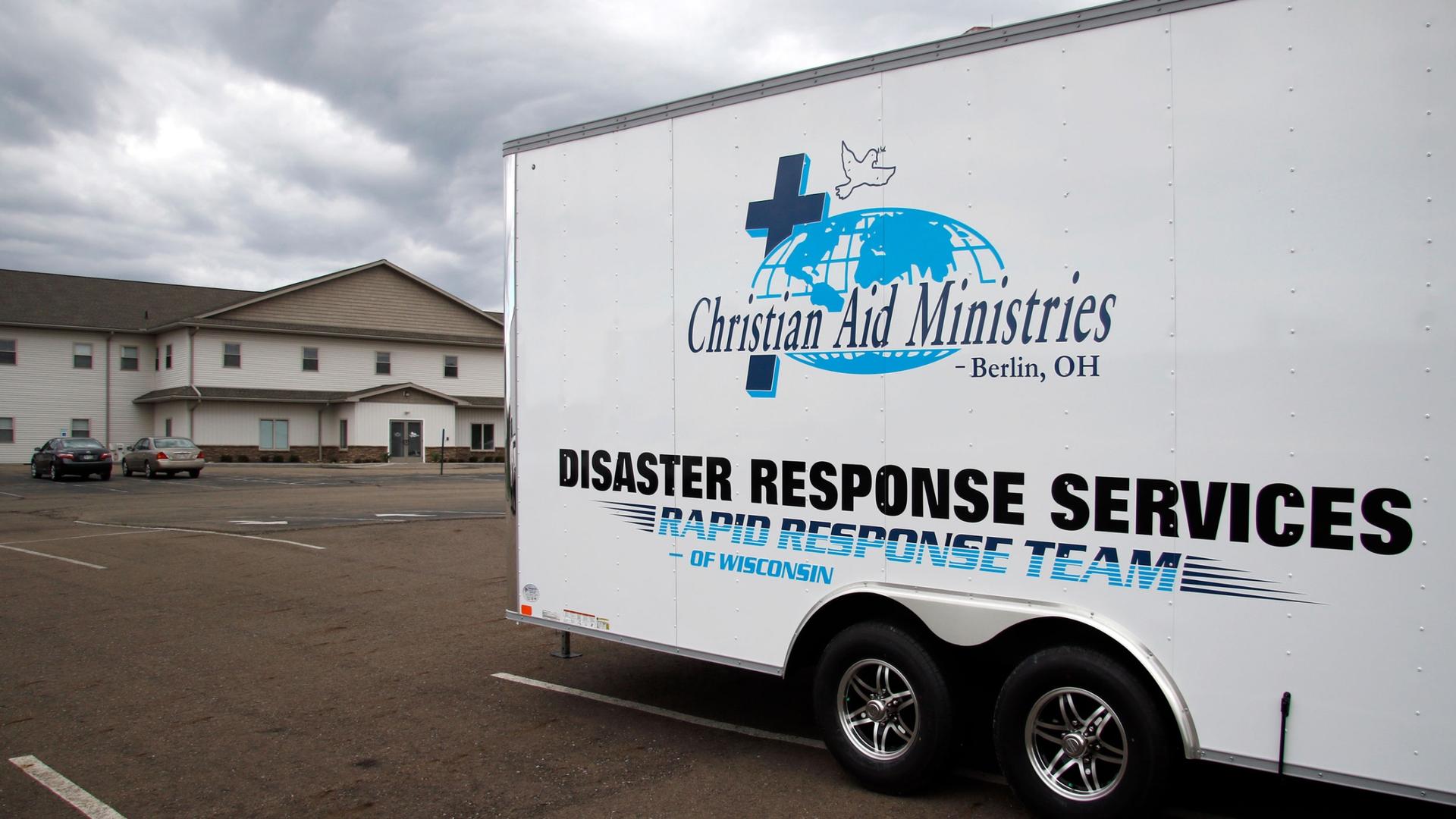 This Sunday, Oct. 17, 2021 photo shows the logo for Christian Aid Ministries in Berlin, Ohio, on a vehicle. 