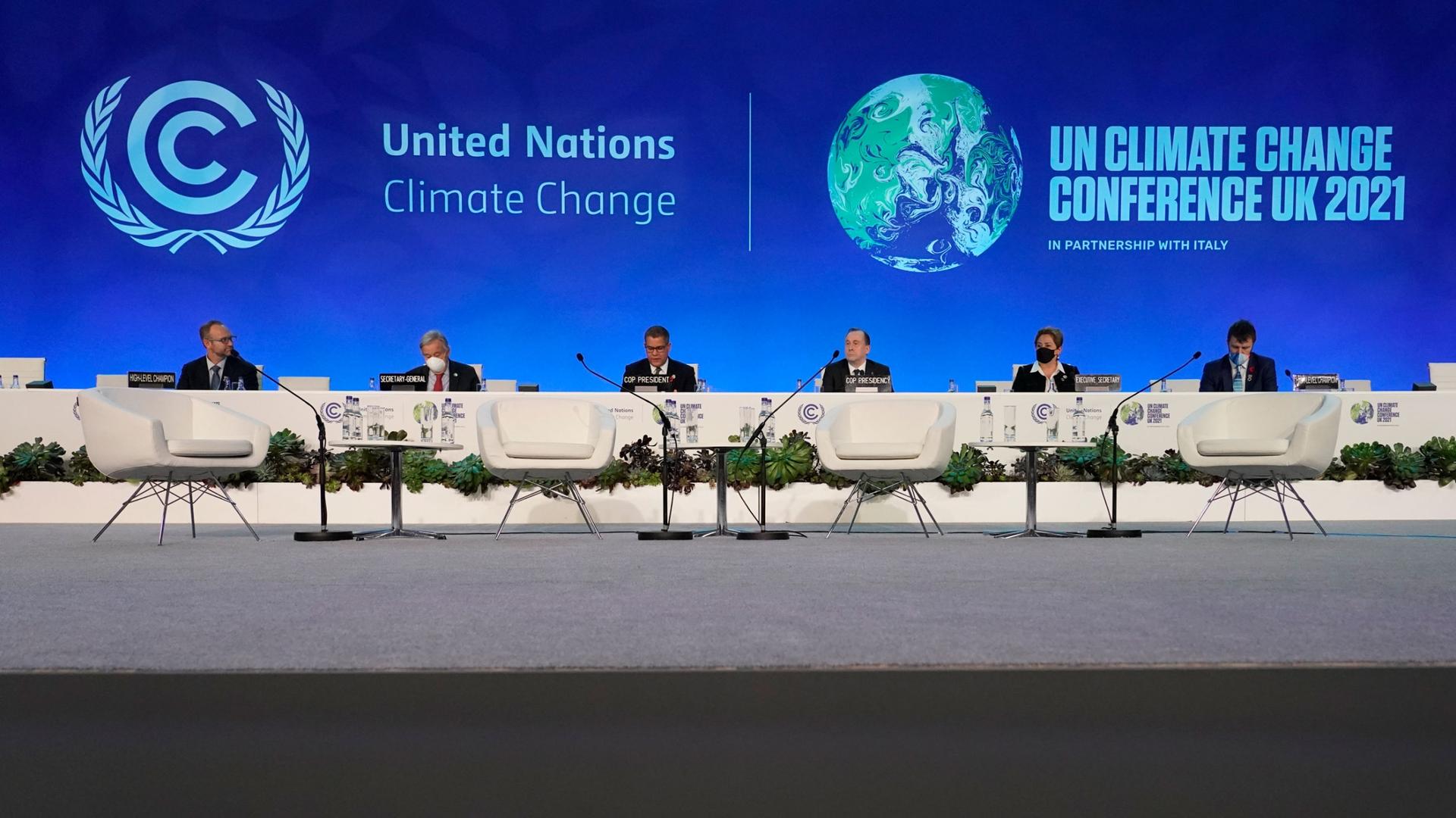 Patricia Espinosa, UNFCCC Executive-Secretary, second right, UN Secretary-General Antonio Guterres, second left, and Alok Sharma President of the COP26 summit, third left, attend a meeting at the COP26 UN Climate Summit in Glasgow, Scotland, Thursday, Nov