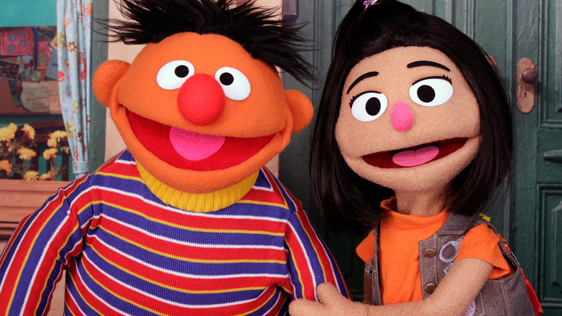 Ernie, a muppet from "Sesame Street," appears with new character Ji-Young, the first Asian American muppet, on the set of the long-running children's program in New York