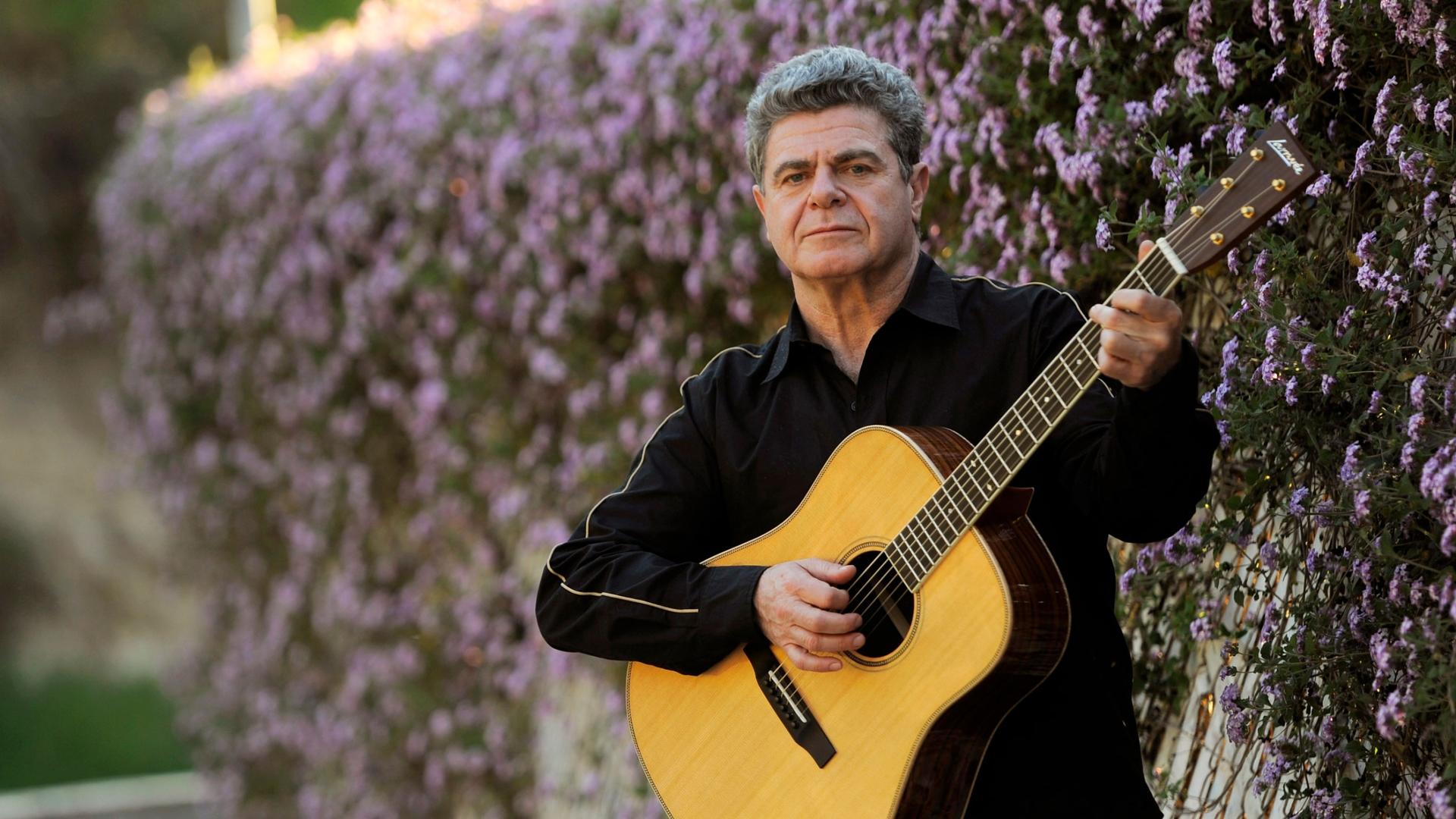 In this March 1, 2013 photo, Argentine recording artist and producer Gustavo Santaolalla poses for a portrait in Los Angeles. 