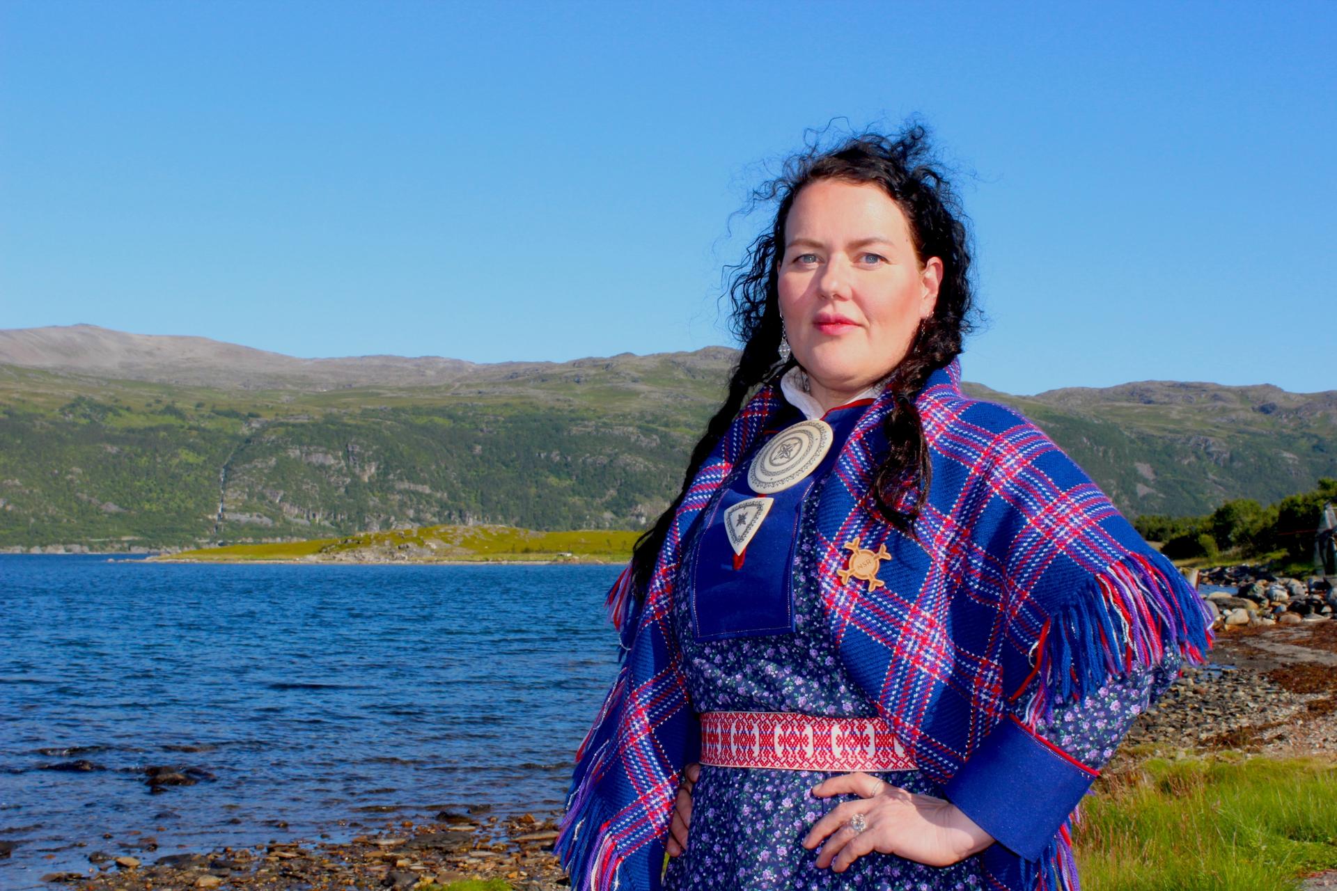 Saami Parliament President Silje Karine Muotka stands by the Repparfjord in the Norwegian Arctic, where protesters have blocked construction on a planned copper mine.
