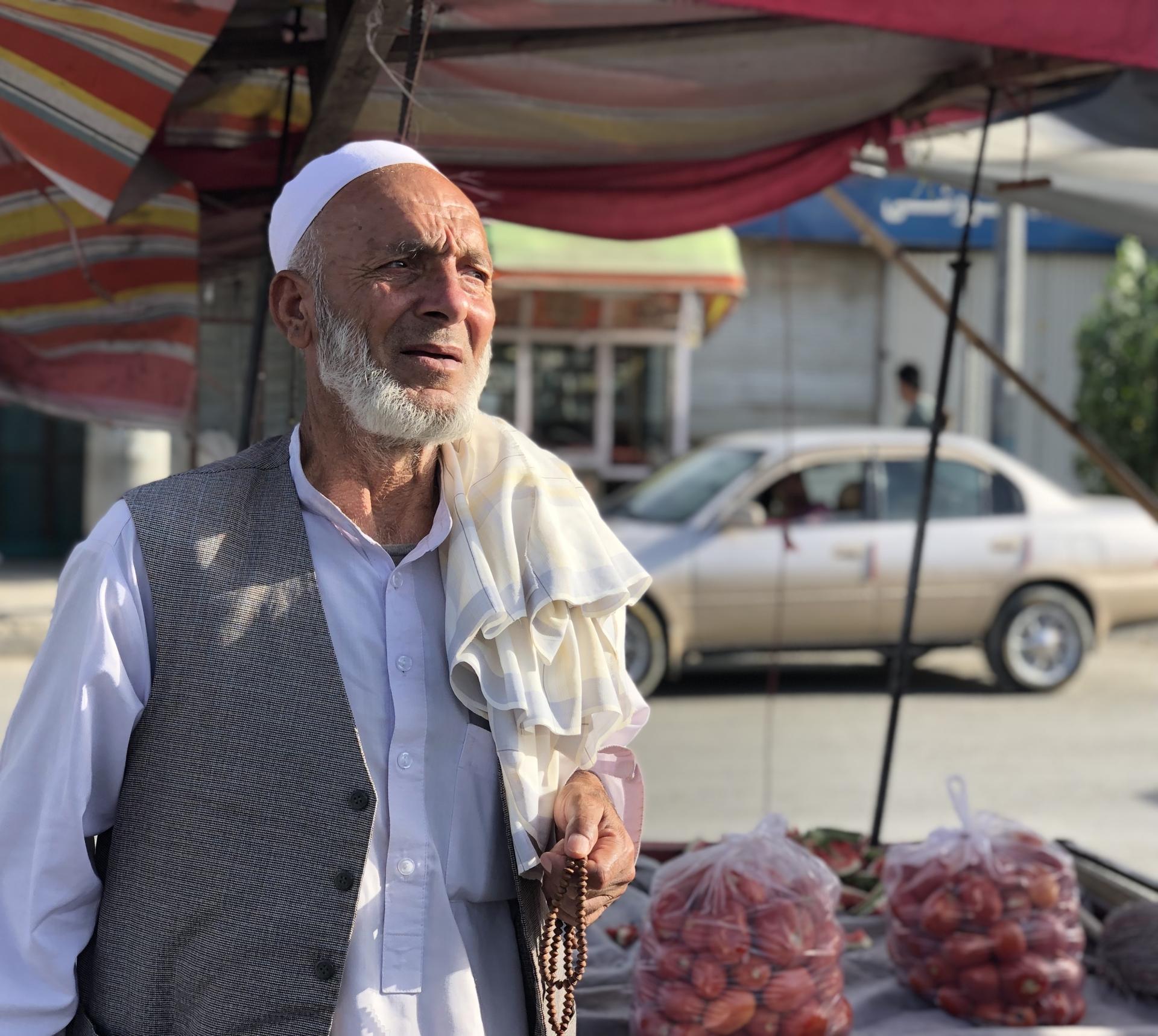 A fruit seller in Kabul, Afghanistan
