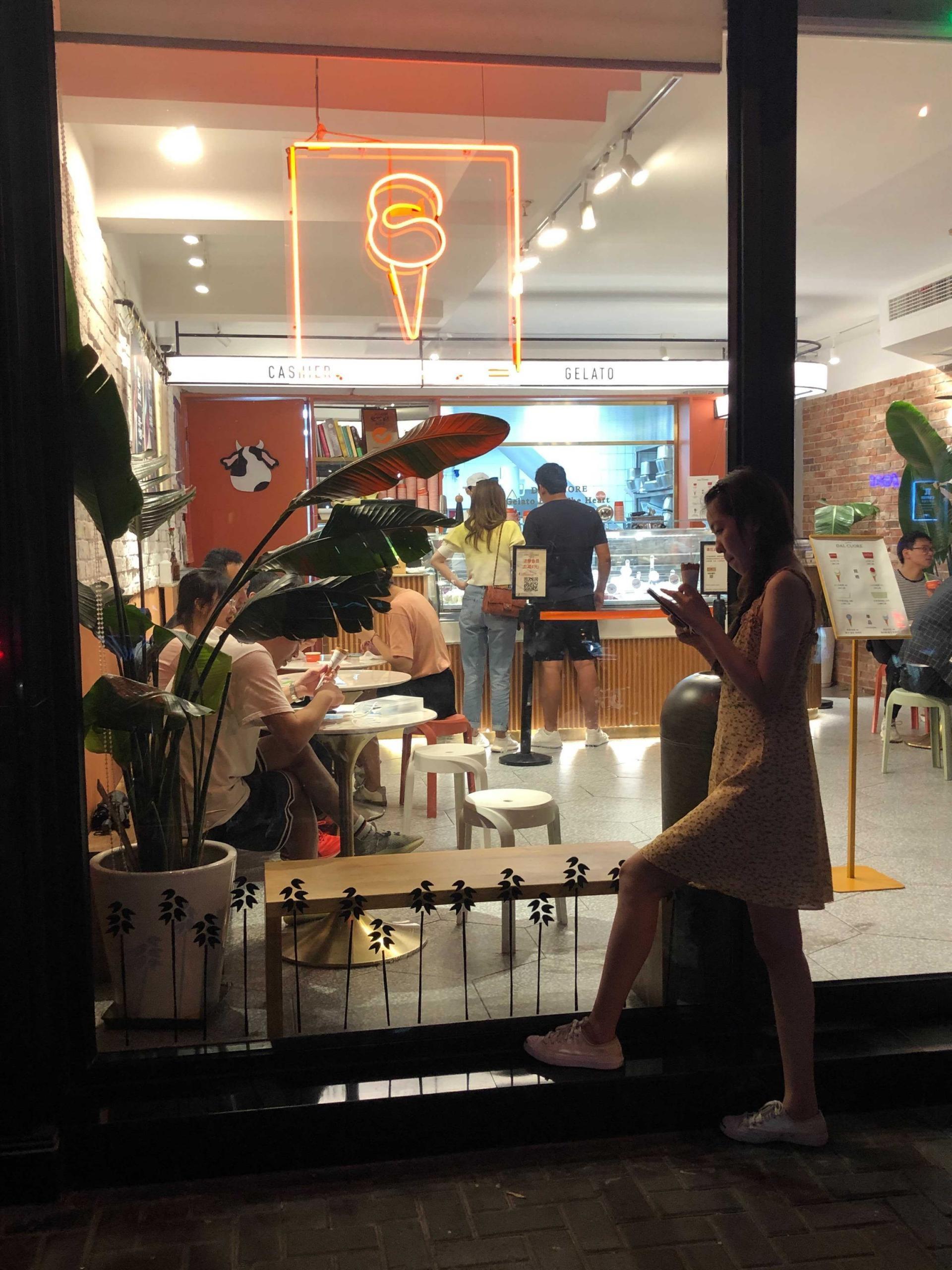 Customers buy ice cream at Gelato Dal Cuore in Shanghai, China.