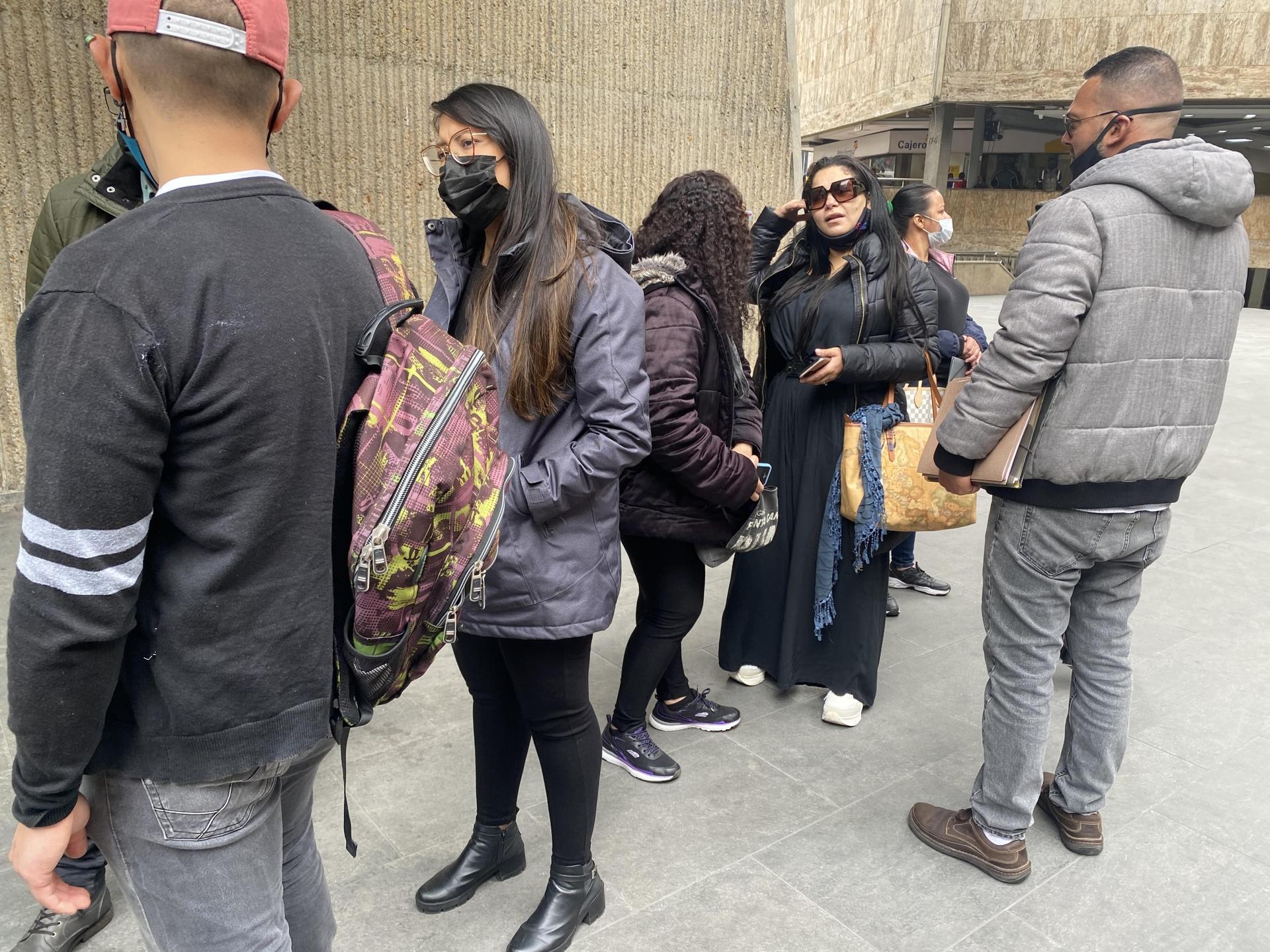 Venezuelan immigrants line up outside a branch of the National Registrar in Bogotá, Colombia.