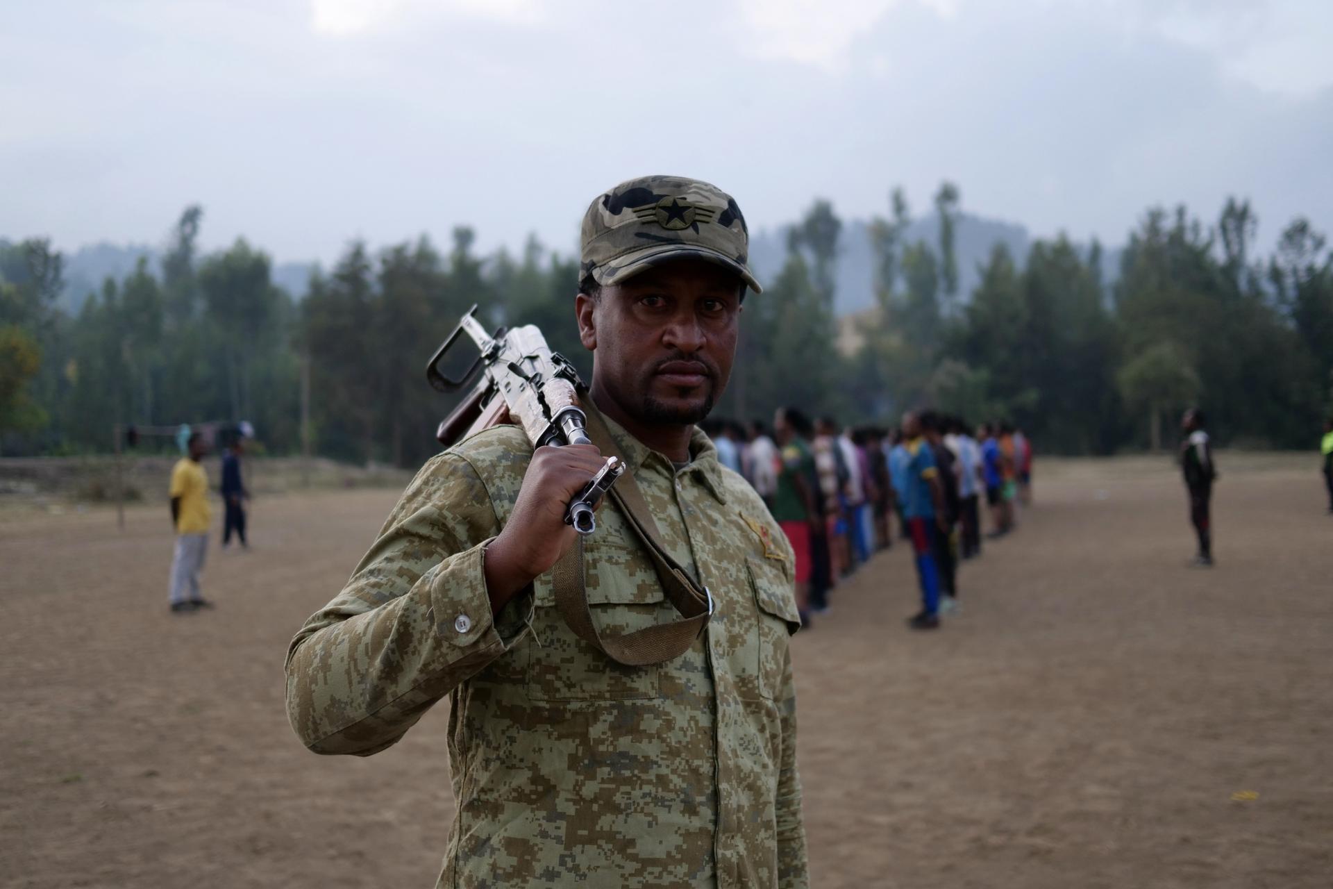 Moges Kebede oversees a training for new civilian recruits to the FANO Amhara militia in Woldiya, Ethiopia, Feb. 20, 2022.