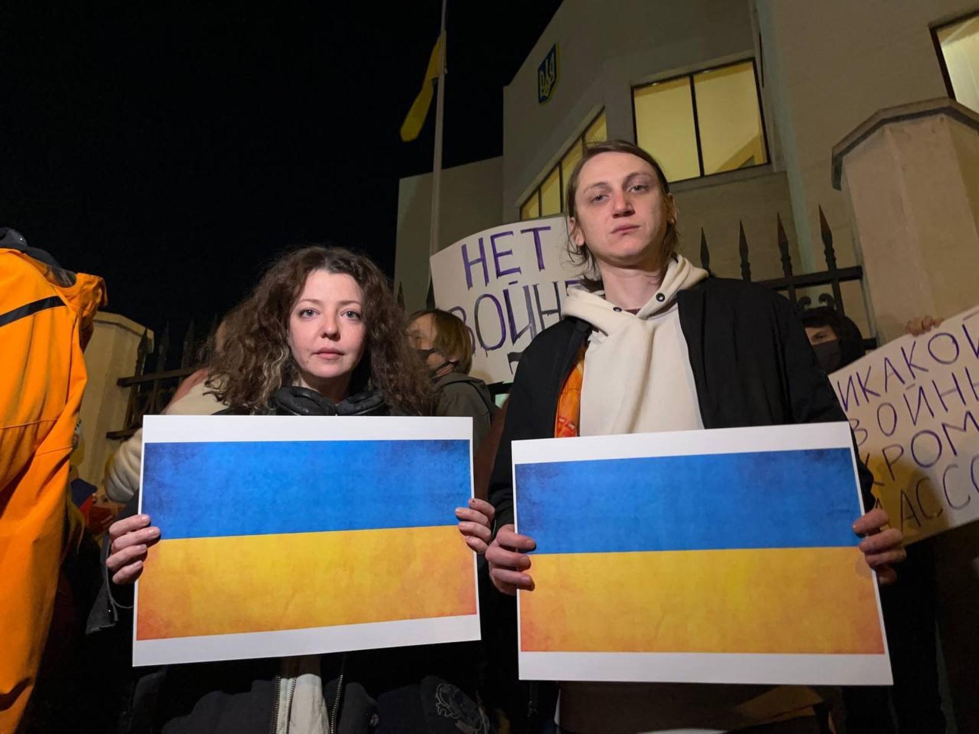 Alina Muzychenko, 36, and Egor Eremeev, 34, protest the war in Ukraine from their new home in Tbilisi, Georgia. `