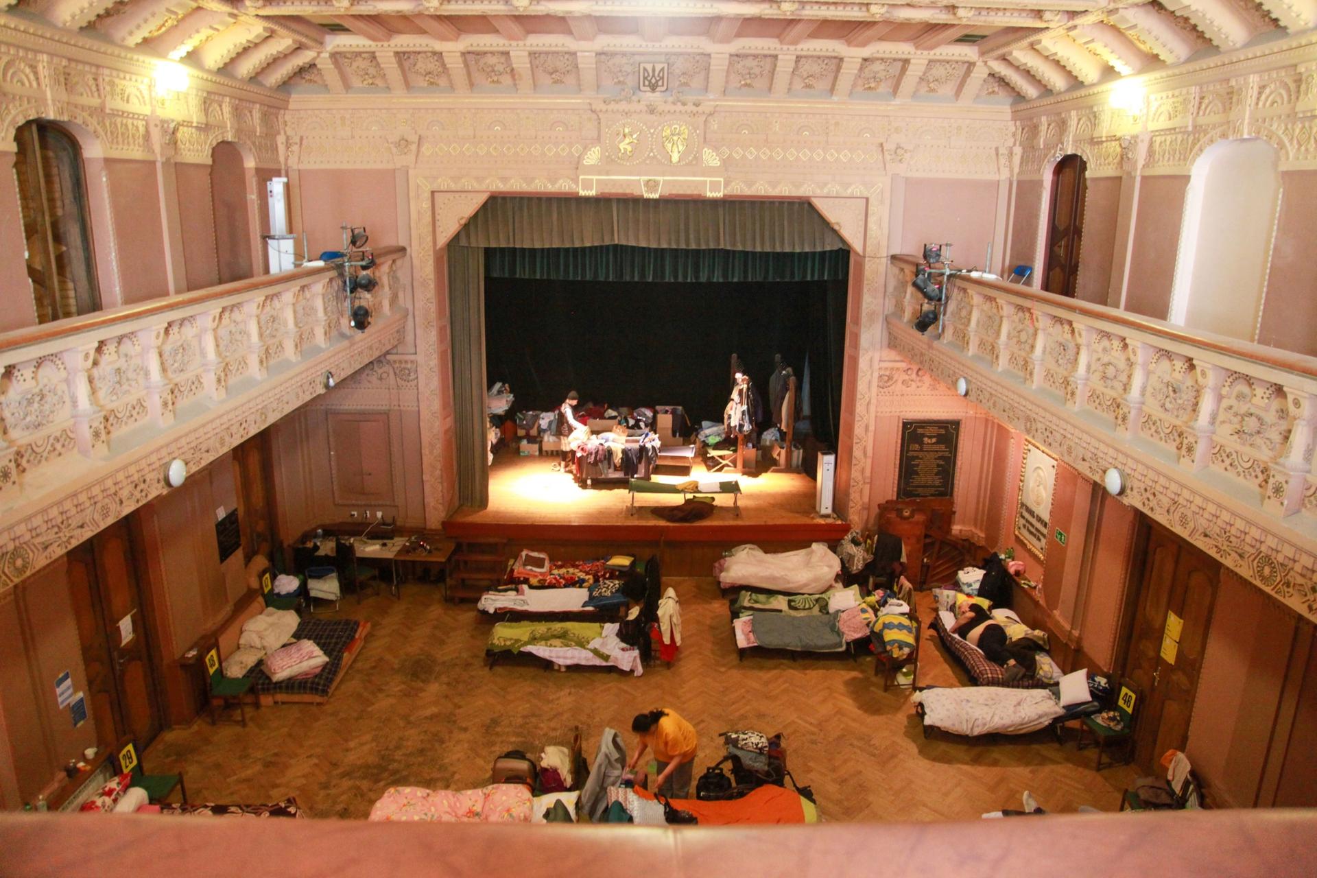 A temporary shelter in an old theater space houses Ukrainian refugees transiting through Przemysl, about 15 minutes from the Ukraine border. 
