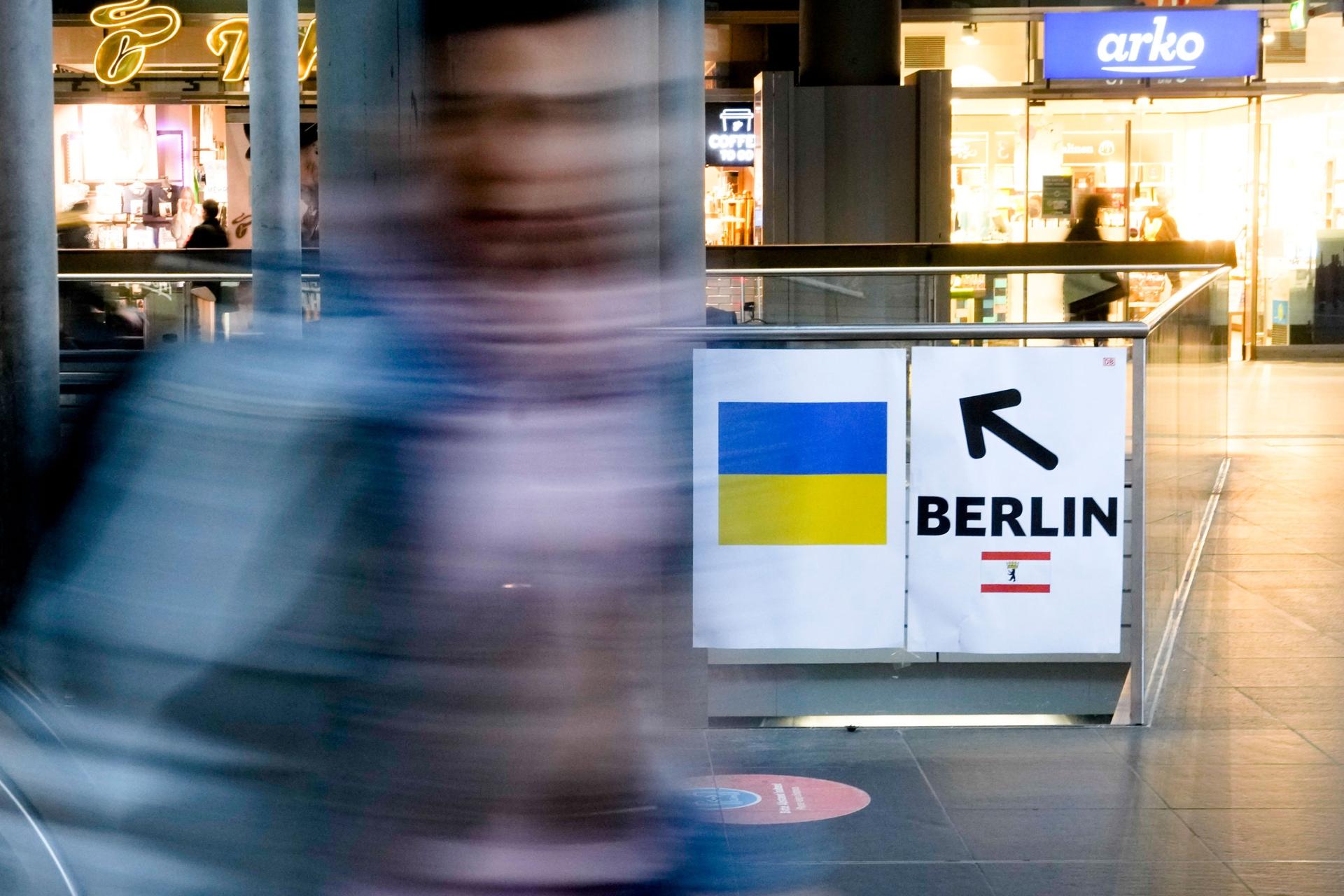 A sign for refugees from the Ukraine is displayed at the main train station in Berlin, Germany, Tuesday, March 15, 2022.