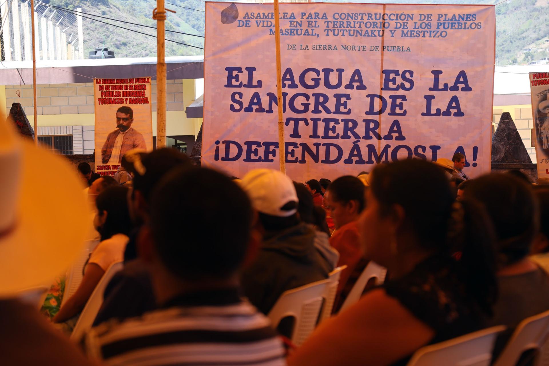 "Water is the blood of the land" reads a sign at a community gathering of Indigenous people in Puebla state. 