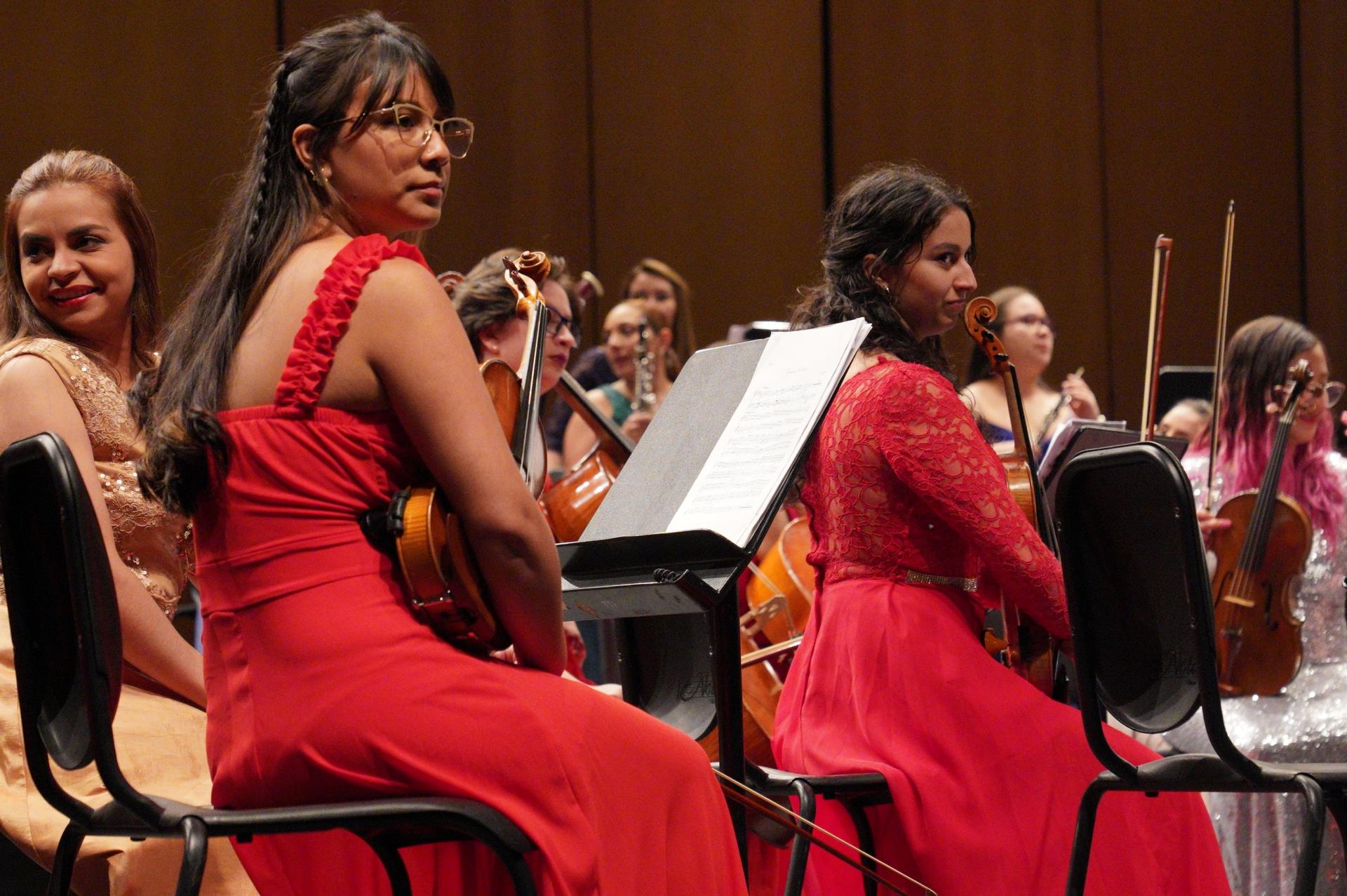 The Bogota Philharmonic Women’s Orchestra gets ready for a show at the Jorge Eliecer Gaitan theater in Bogotá, Colombia