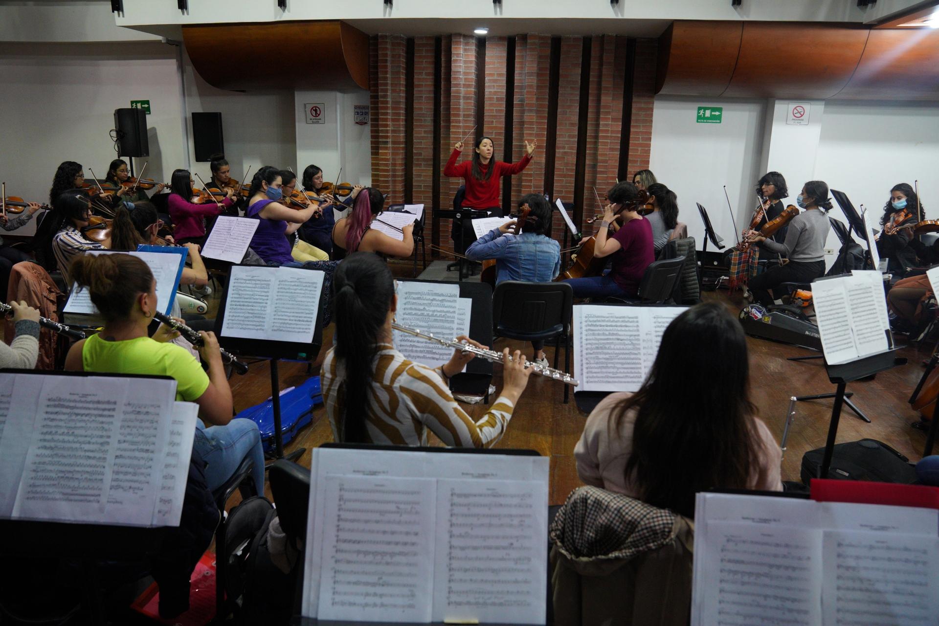 Paola Avila conducts as the Bogotá Philharmonic Women’s Orchestra rehearses a piece by female composer Louise Farrenc