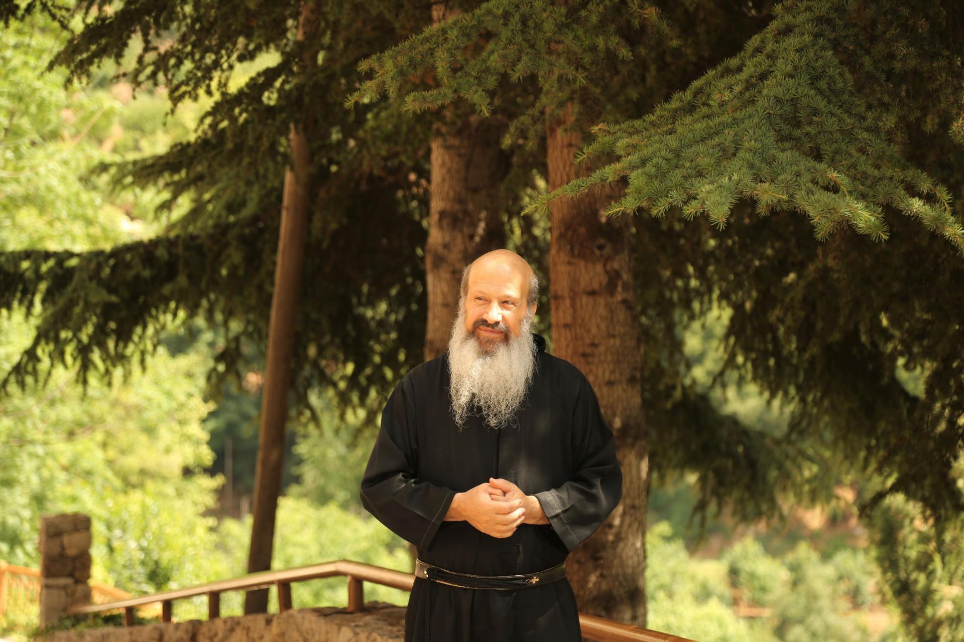 Father Kamil Kayrouz stands near a small grove cedar trees outside the Monastery of St. Anthony. “These were planted when I came here,” he mused. Already, they’ve grown quite tall. 