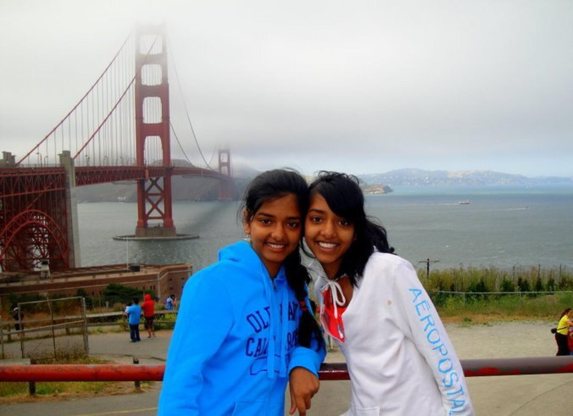 two girls in front of the Golden Gate Bridge