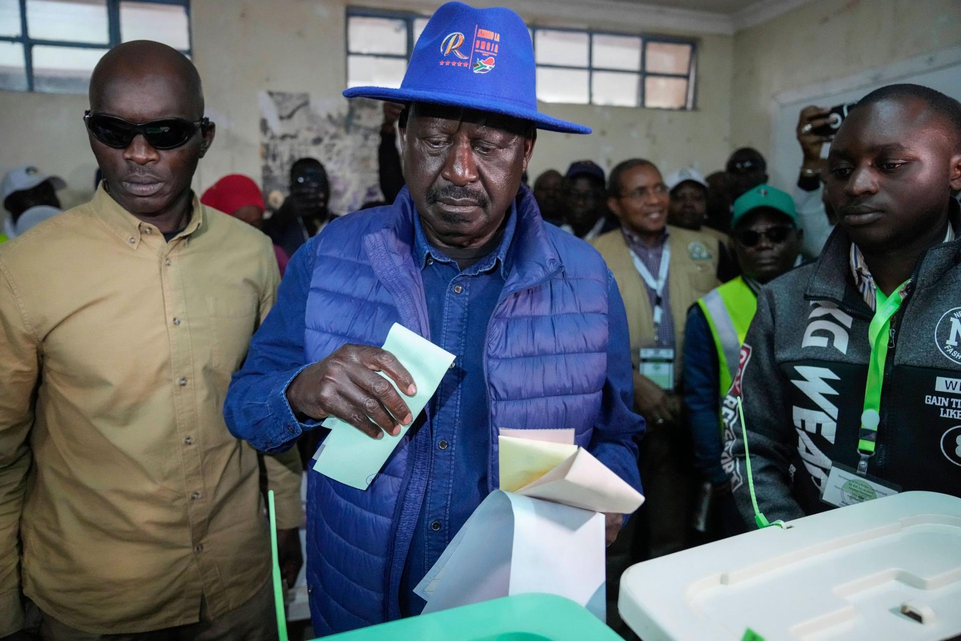 Presidential candidate Raila Odinga casts his vote inside a polling station at the Kibera Primary School in Nairobi, Kenya, Tuesday, Aug. 9, 2022. 