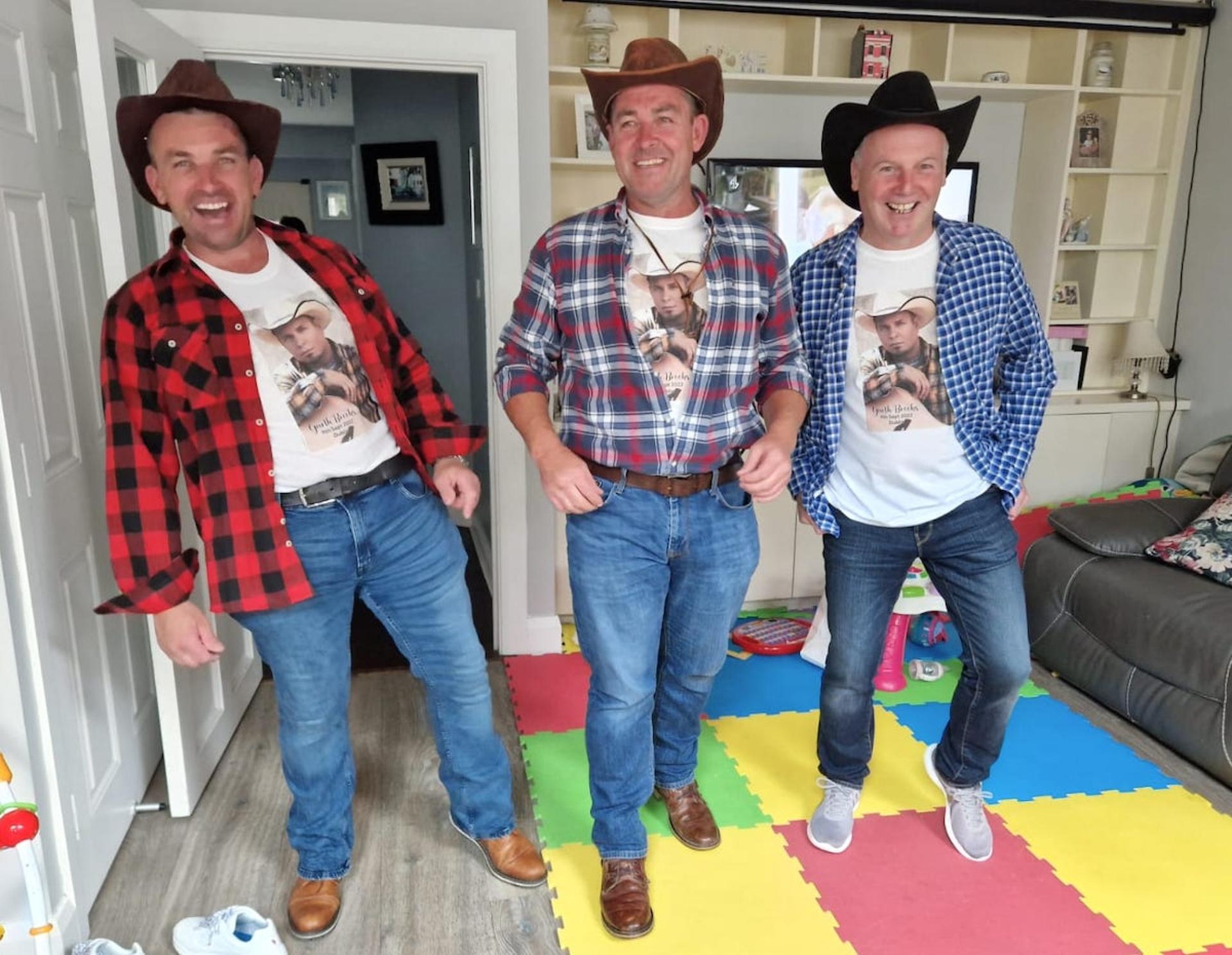 three men in Western attire