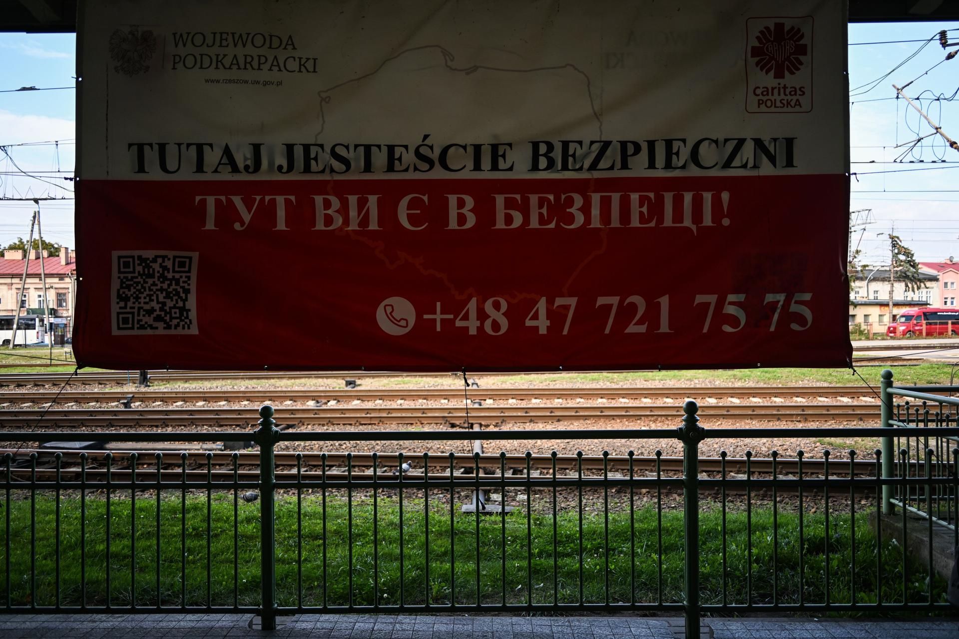 A banner saying "You're safe here" hangs at the Przemyśl train station on Oct. 6, 2022 in Przemyśl, Poland.