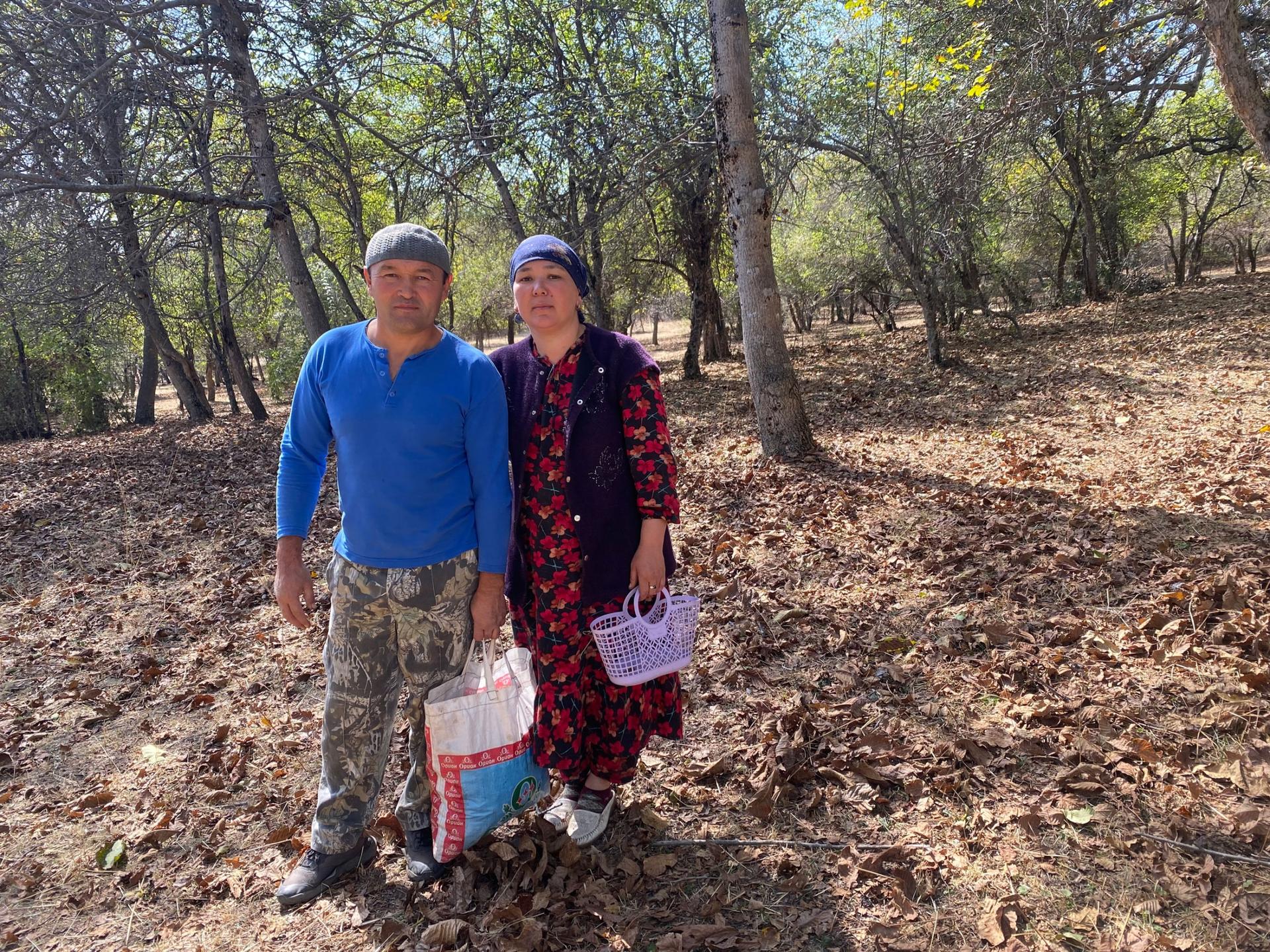 Bakhadir Fazilov and Nuribat Fazilova spend up to two months camped out in the walnut forests of southern Kyrgyzstan each fall harvesting the nuts with their four children. 