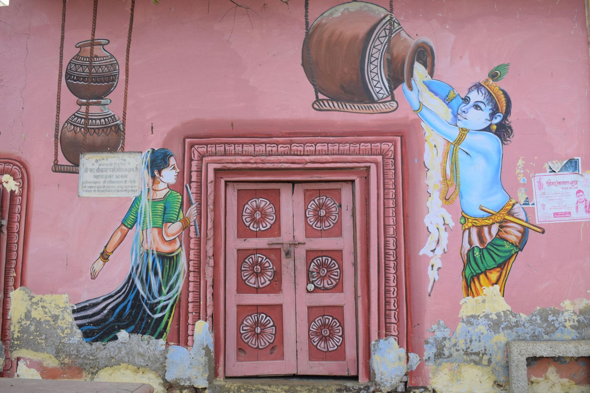 Wall art depicting a scene from Lord Krishna’s life near the ashram where Purnendu Goswani lives in Vrindavan, India.