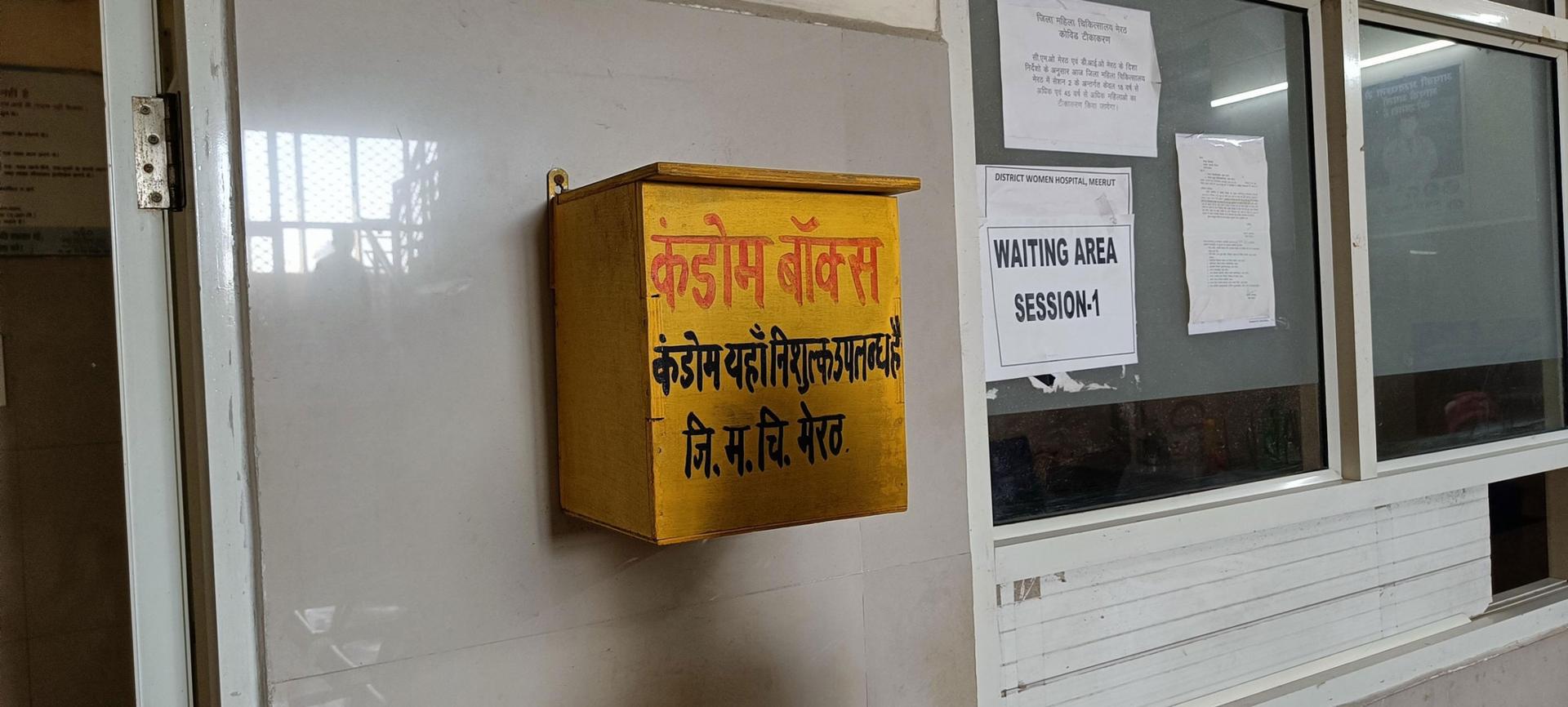 Wooden boxes full of free condoms are mounted on the walls on Meerut's district women's hospital.