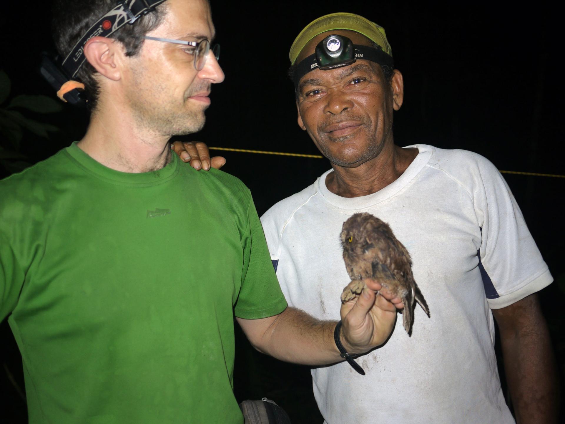 Ceciliano do Bom Jesus (right) , nicknamed Bikegila was an essential partner in finding the owl. To honor his efforts, researcher Martim Melo (left) proposed they give the owl the Latin name Otus bikegila.