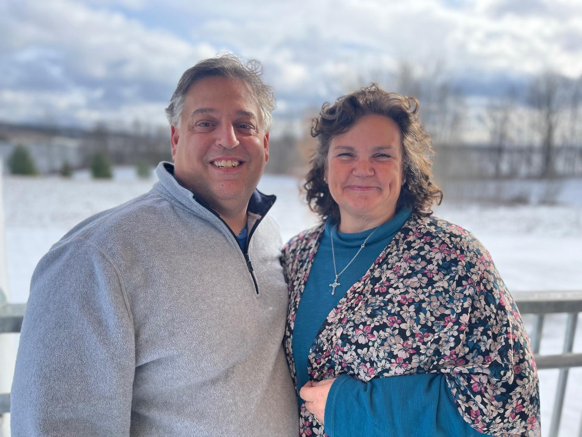 Scott and Theresa Cianciolo on the porch of the Agape Ministries house in Derby, Vermont.