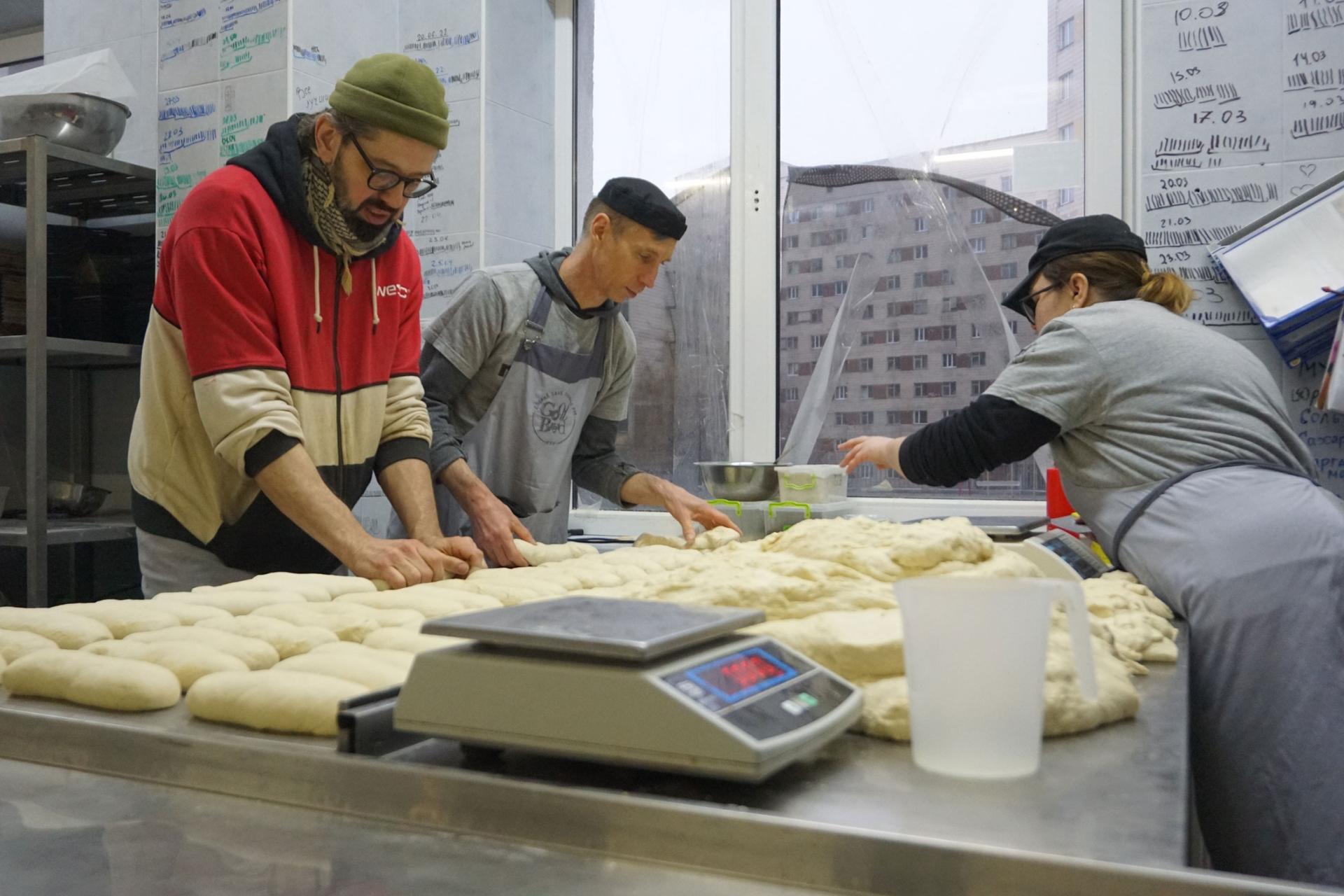 Volunteers in action at Good Bread Bakery in Kyiv. 