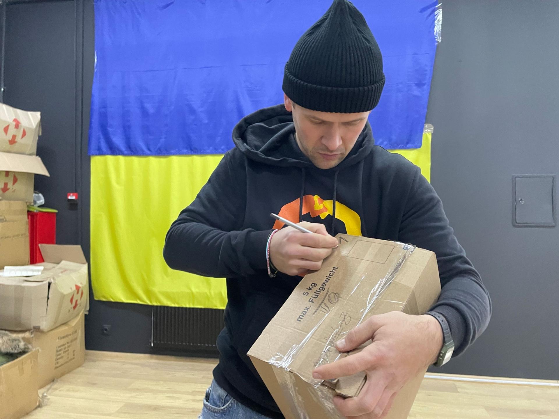 Anton Nesterko is a competitive ballroom dancer and the founder of PoParam, a volunteer organization based in this dance studio in Kyiv, that sends gear like clothing, socks and sleeping bags to Ukrainian soldiers on the fronts lines.